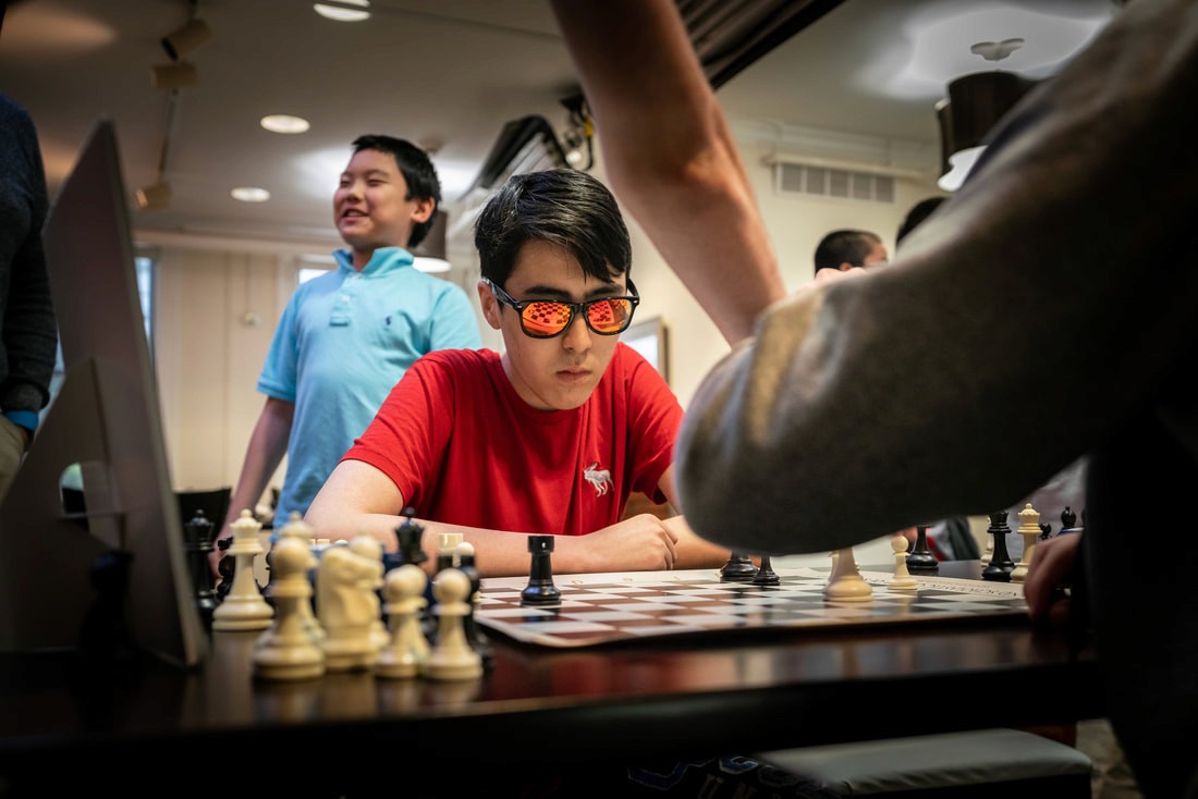 Student Playing Chess
