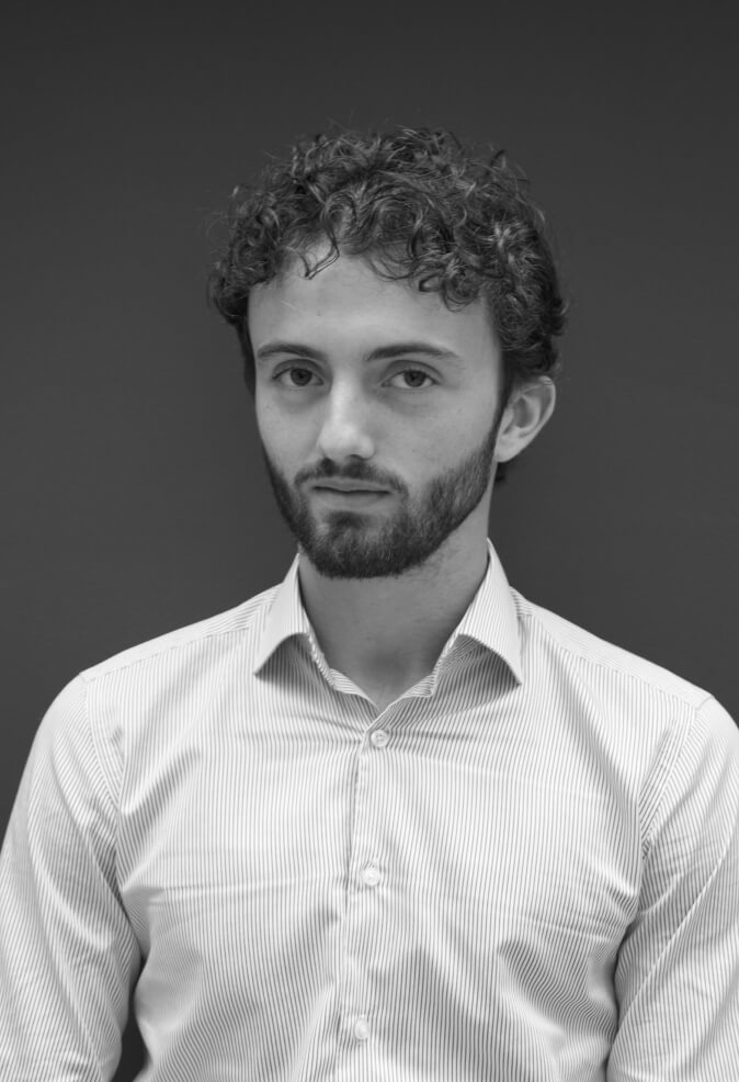 a man with a beard wearing a hat