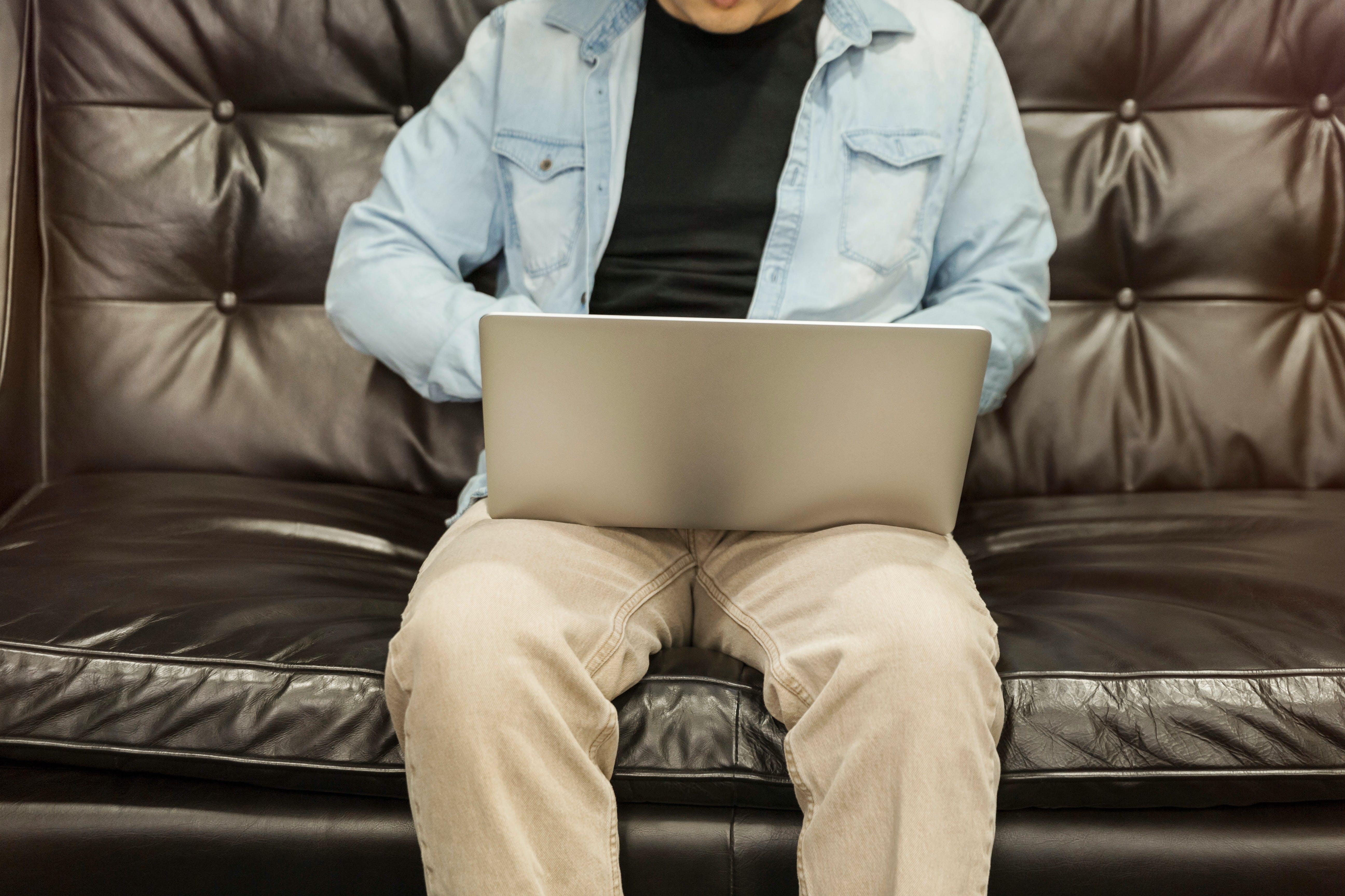 Man using laptop sending 200 cold emails a day