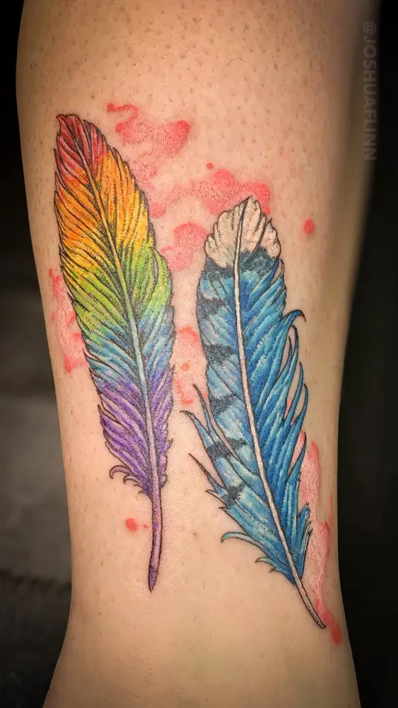 watercolor pair of feathers tattoo