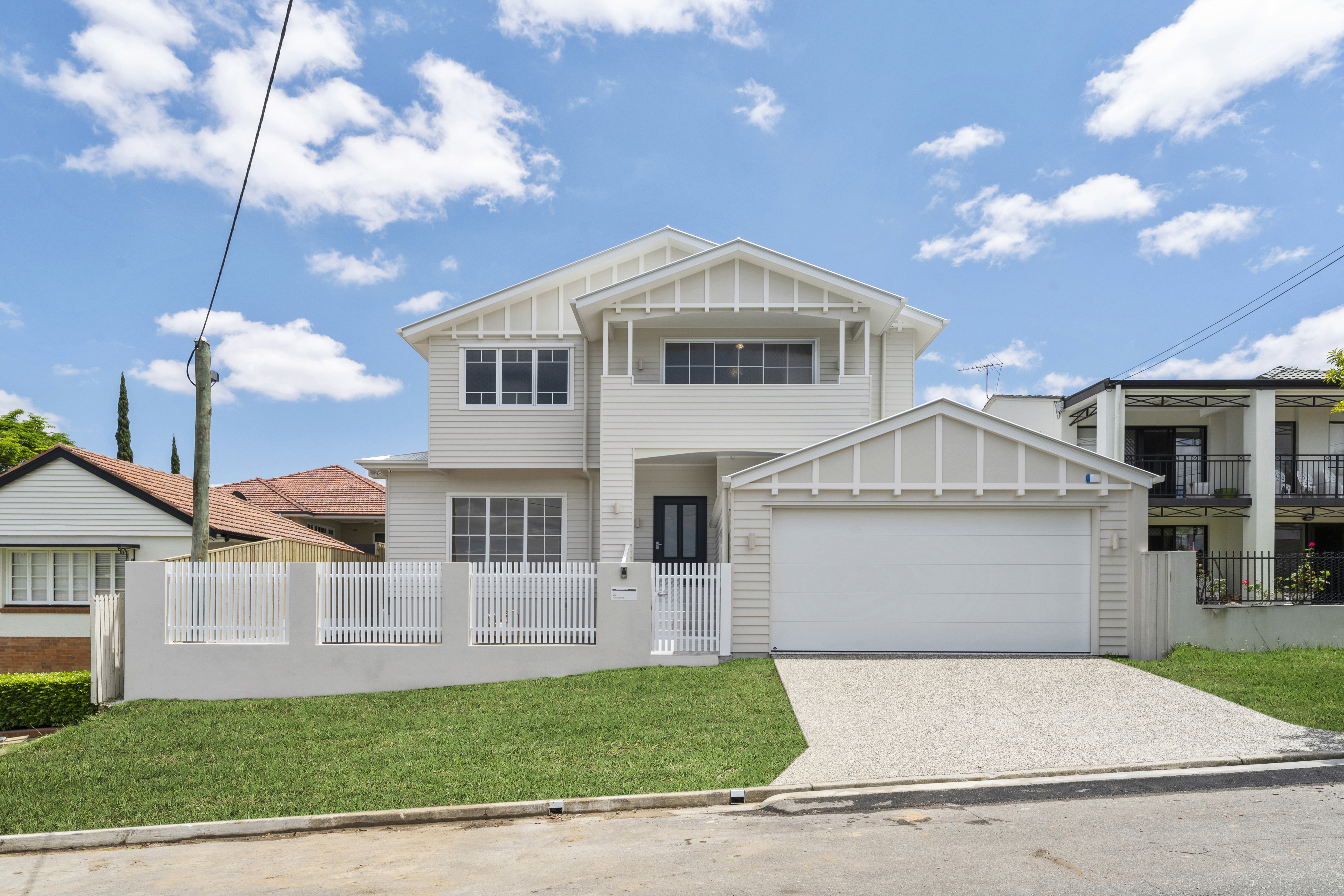 Custom built home on a sloping block in Brisbane by Flascon Construction Group