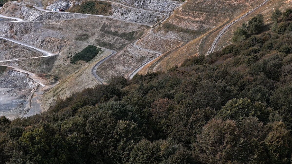 Quiet aggregate quarry with benches and haul roads