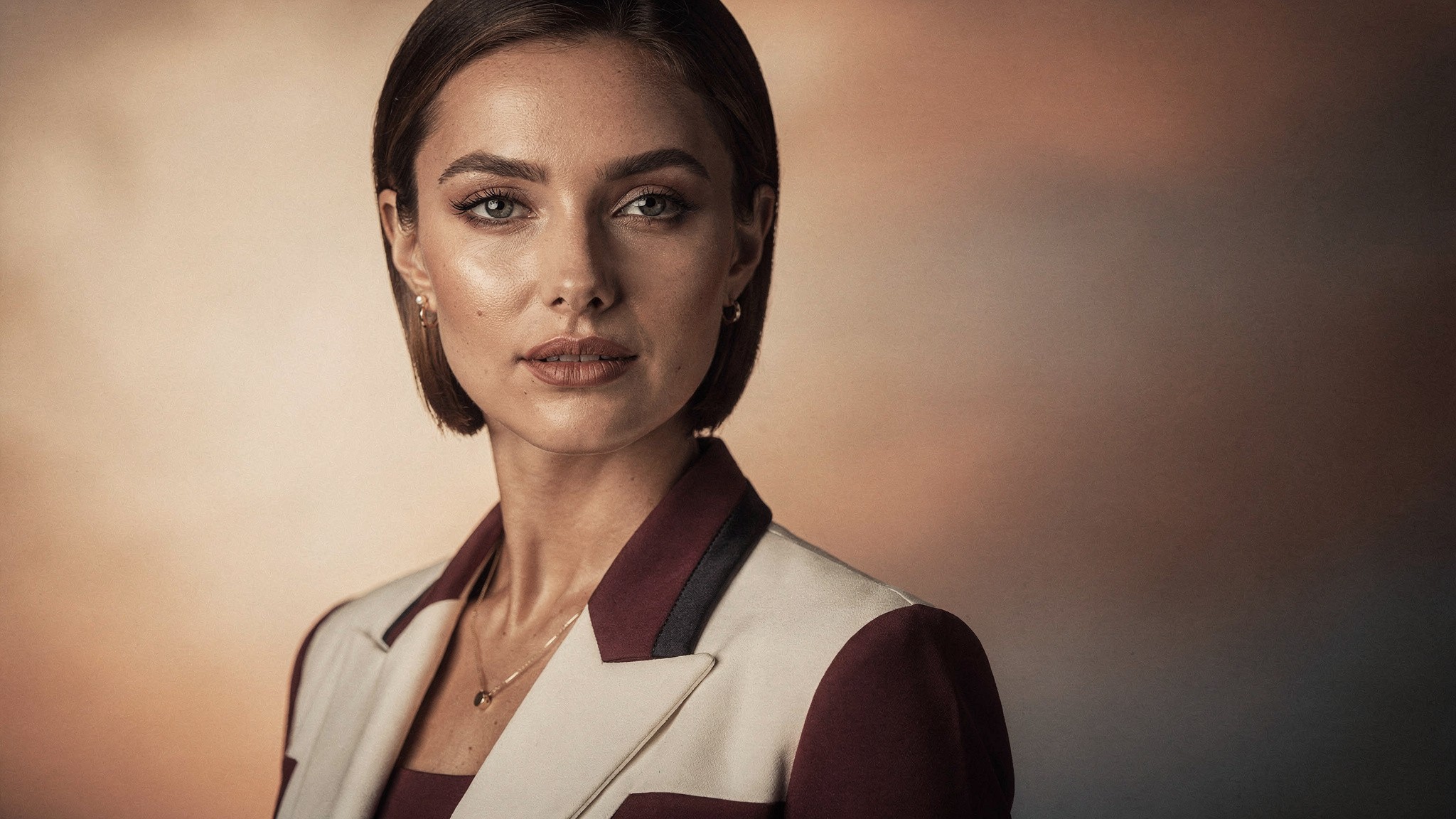 AI-style influencer character in a warm editorial portrait, how to create an ai influencer