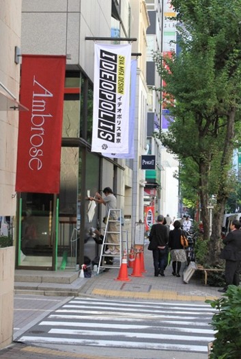 people working on the ideopolis exhibition front entrance of the building