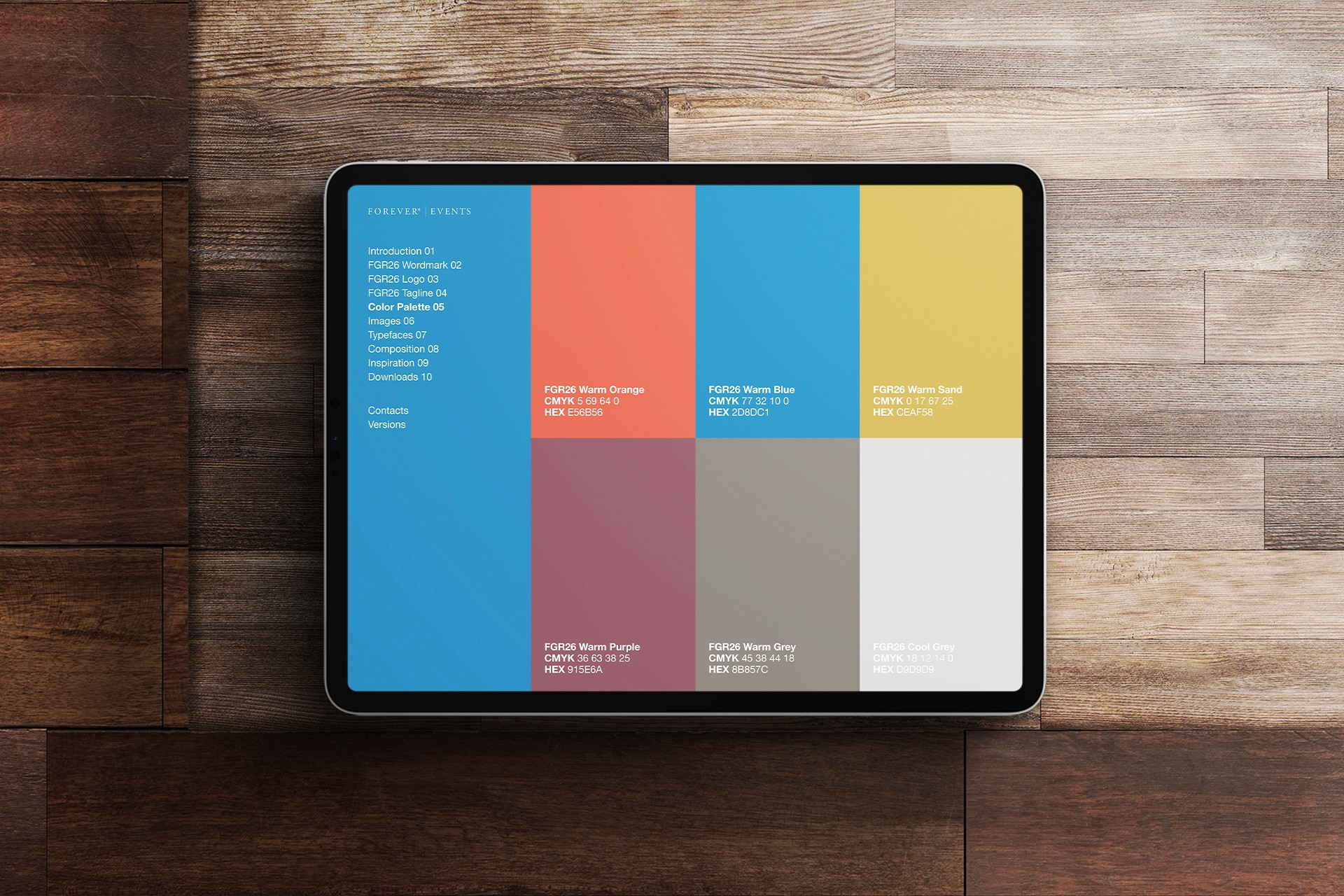 Event style guide set on an iPad on a wooden background