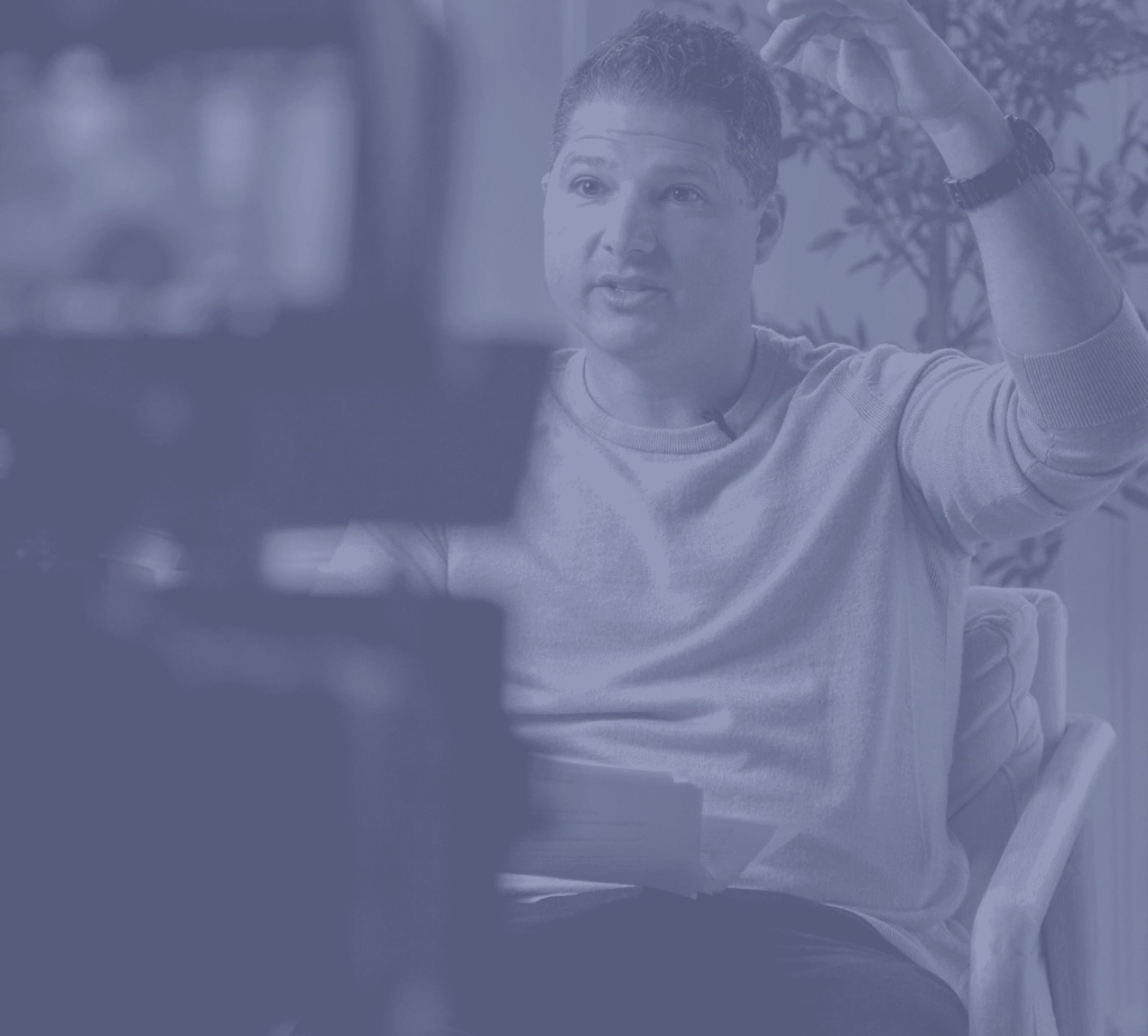 jon talking in front of a camera