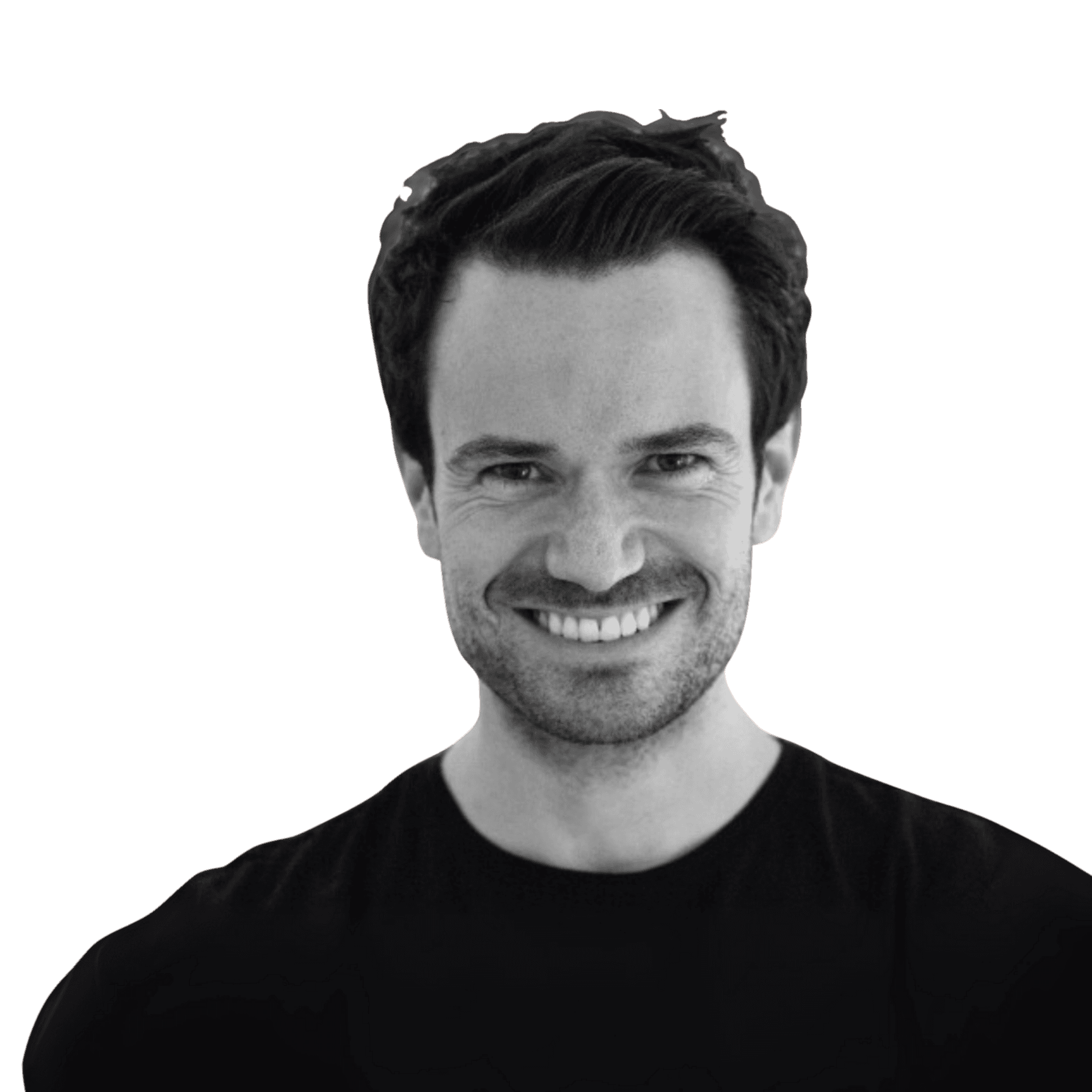 Close-up of a tree stump showing growth rings and a textured brown wood surface.