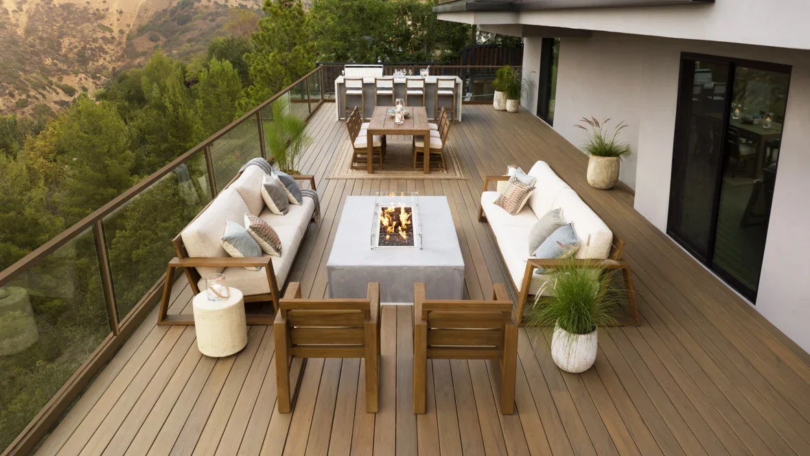 TimberTech premium decking samples led by Coastline with Weathered Teak, French White Oak, and English Walnut finishes