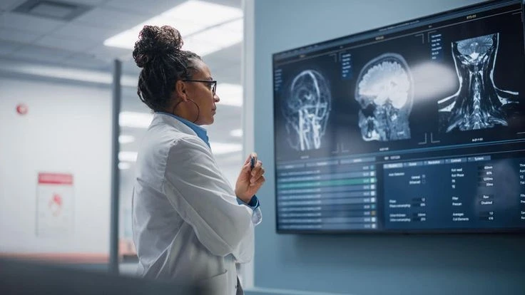 Neuroscience Doctor looking at the scans of a patient