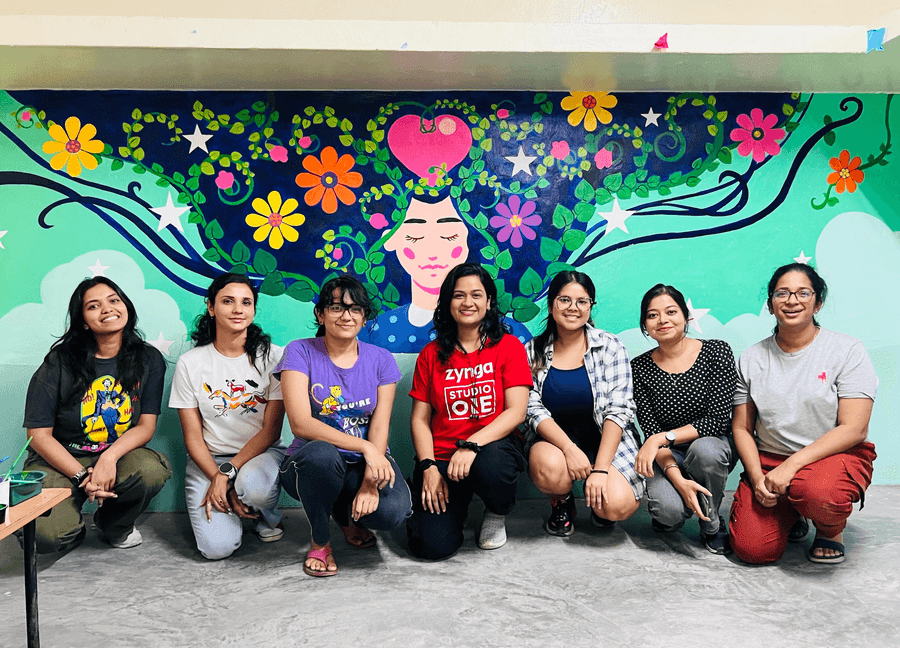 Painting a mural in a classroom in a suburb