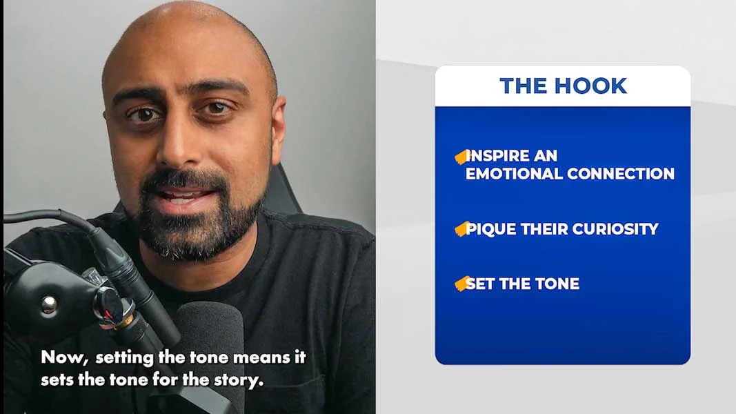 man-speaking-into-a-microphone-next-to-a-presentation-slide-about-creating-a-strong-hook
