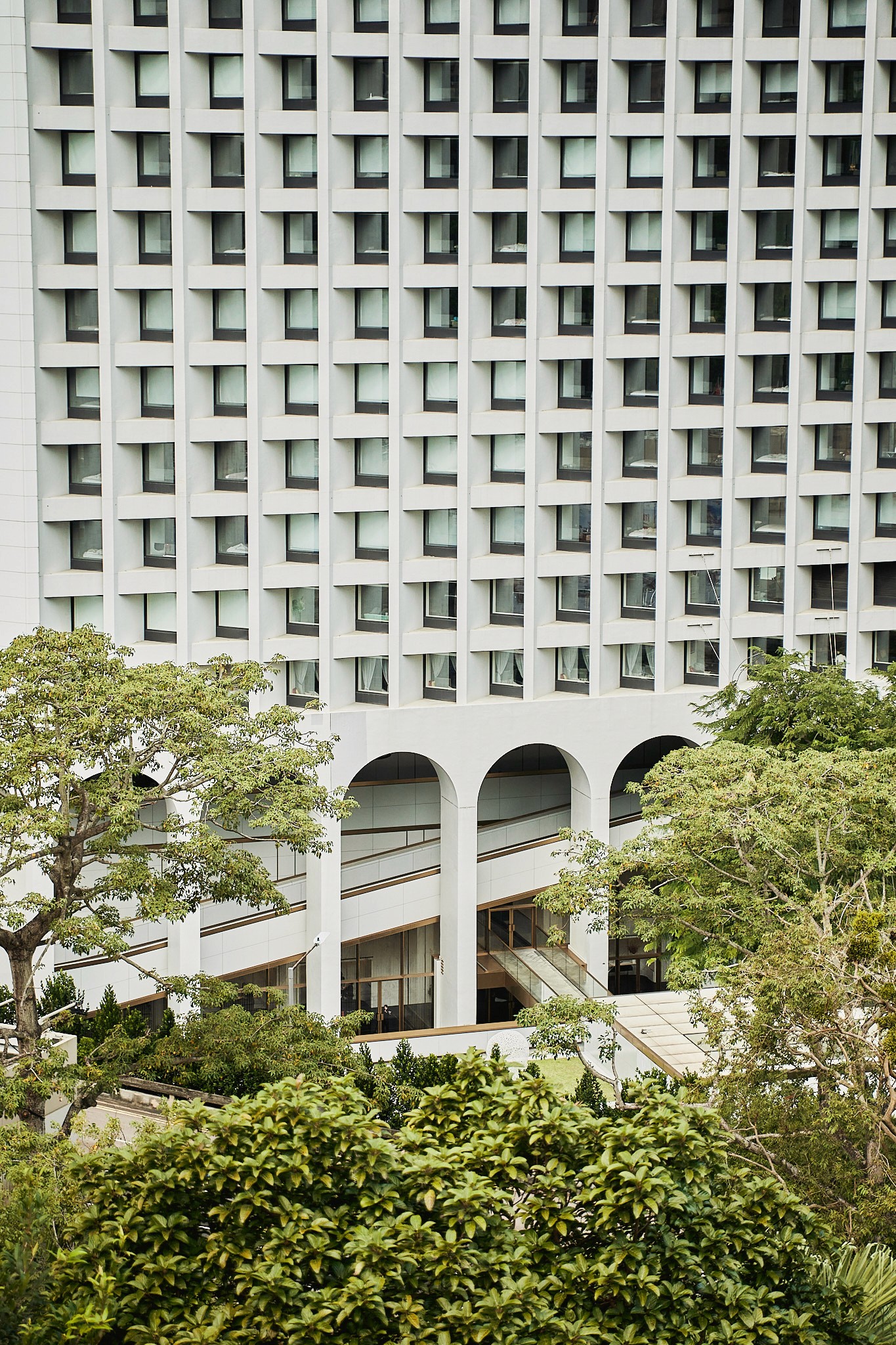 Editorial style image of men handling clay.