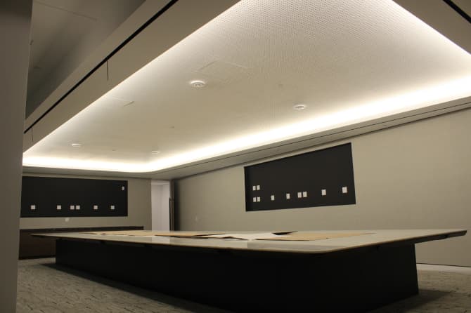 Conference room with a large light hanging overhead