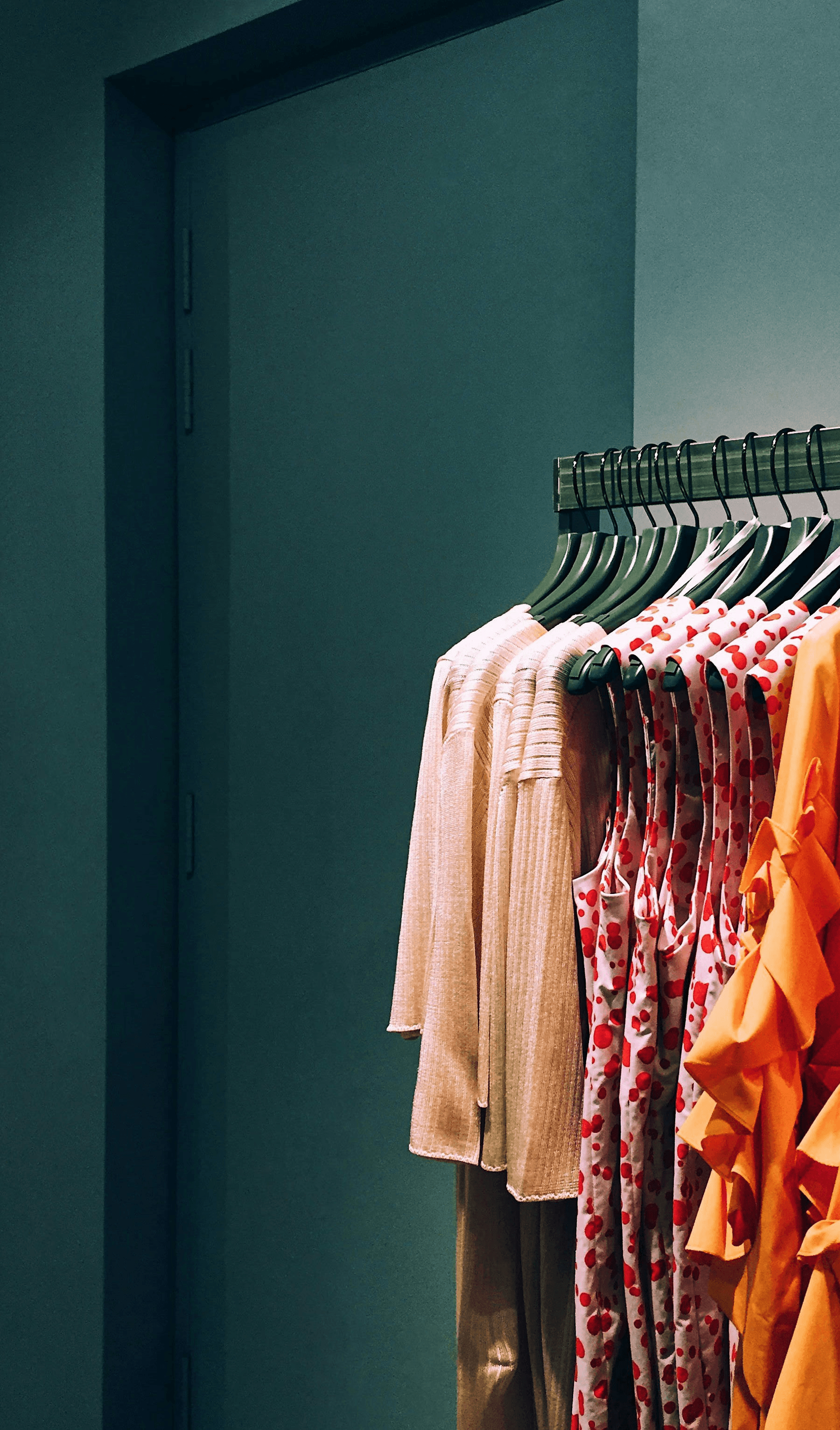 assorted-color shirt lot hang on rack