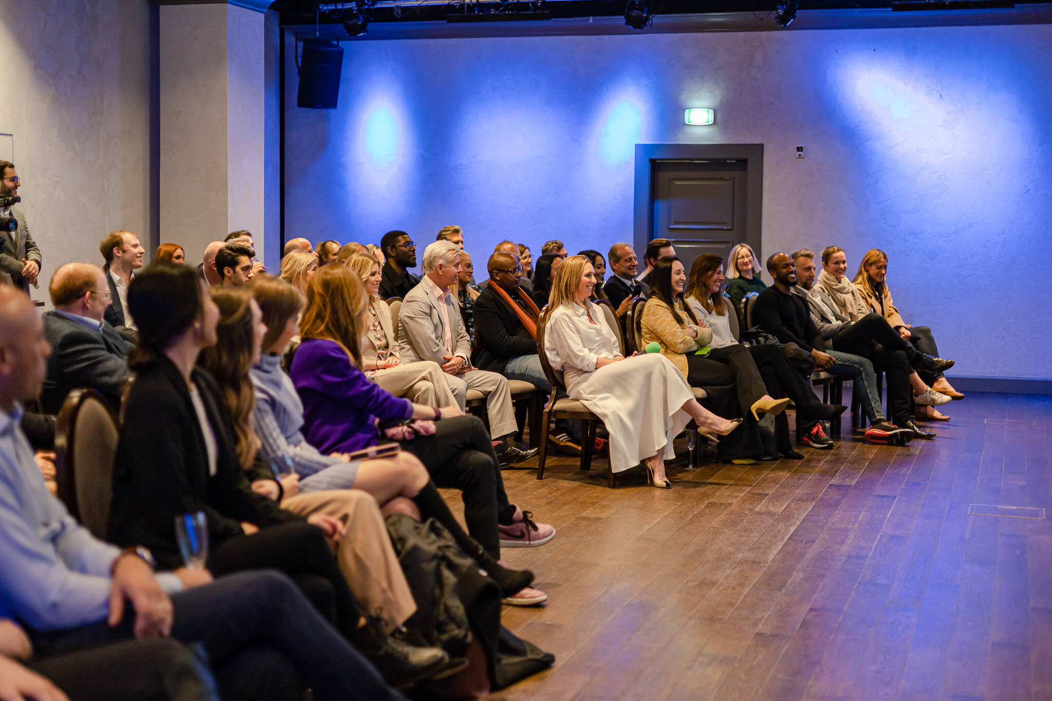 Audience attending a women in finance business event and panel discussion