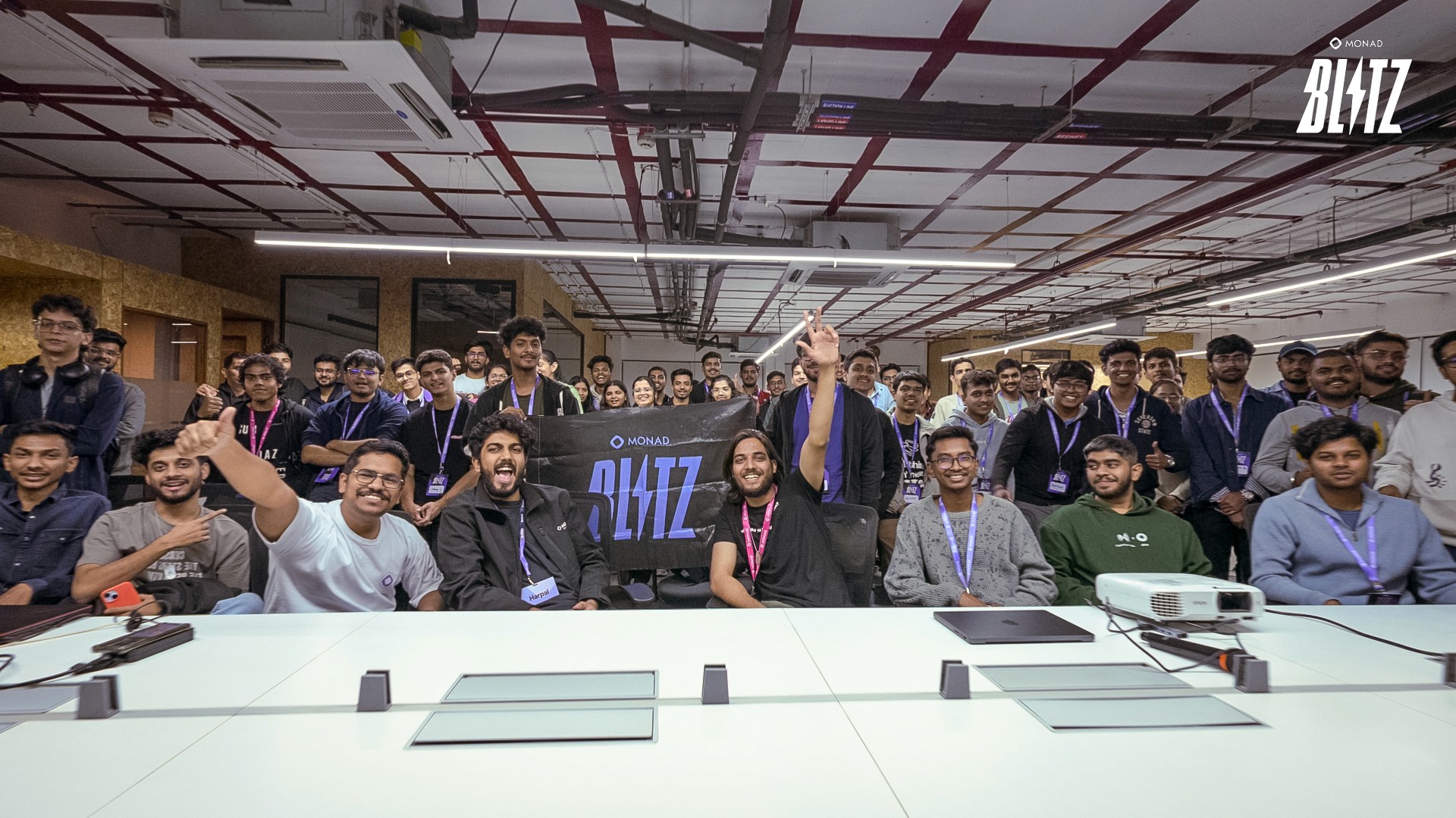 Developers collaborating during blockchain hackathon