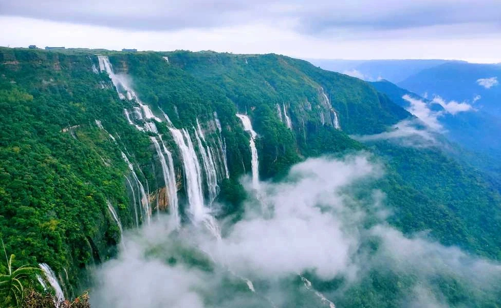 Misty multi-tier waterfalls