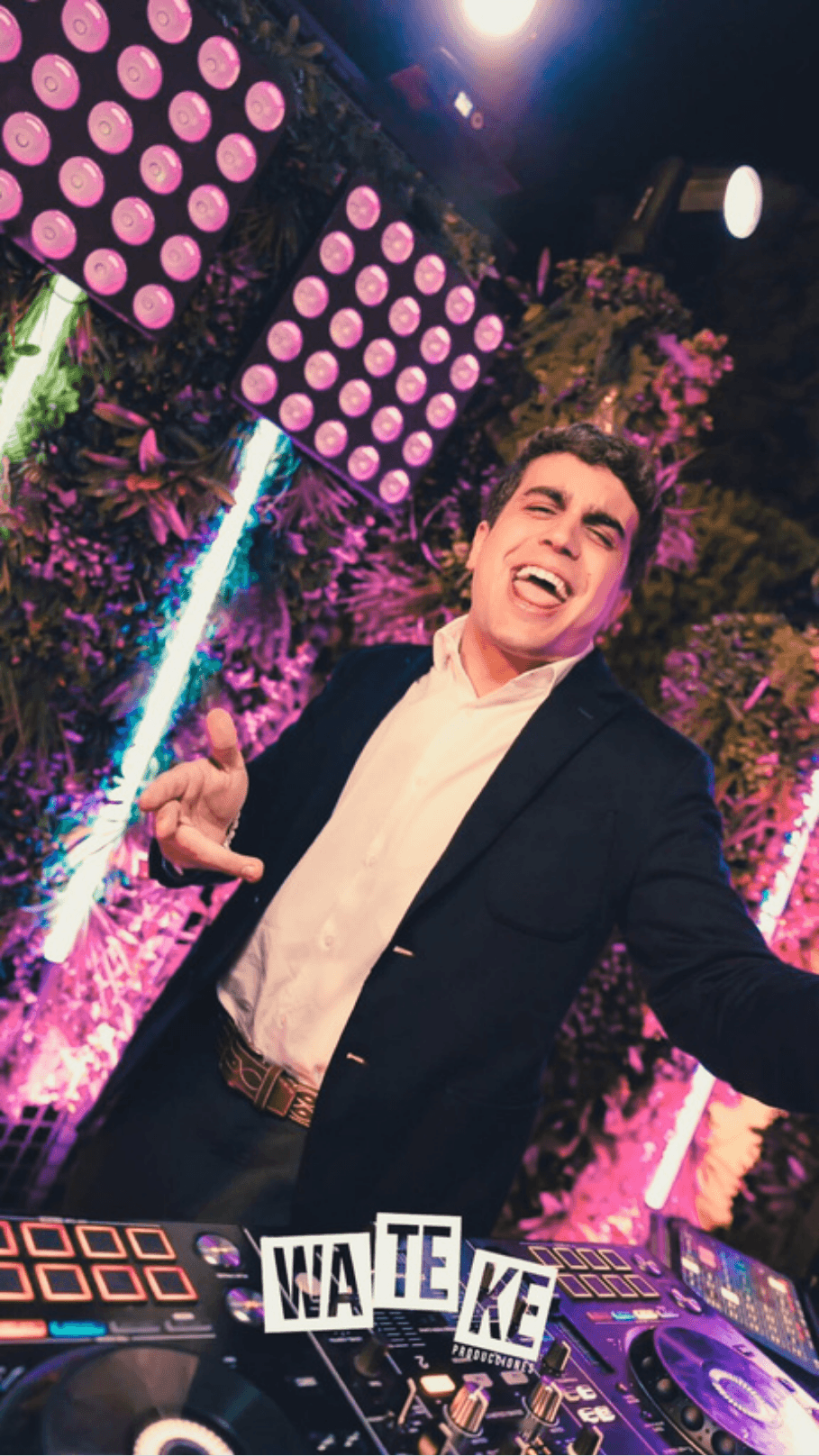 brown wooden lounger near body of water