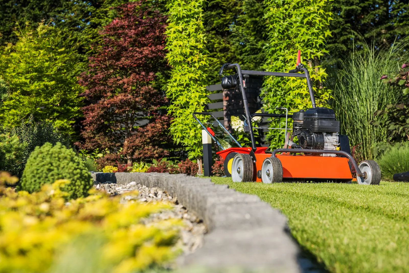 core lawn aerator machine on pristine healthy lawn