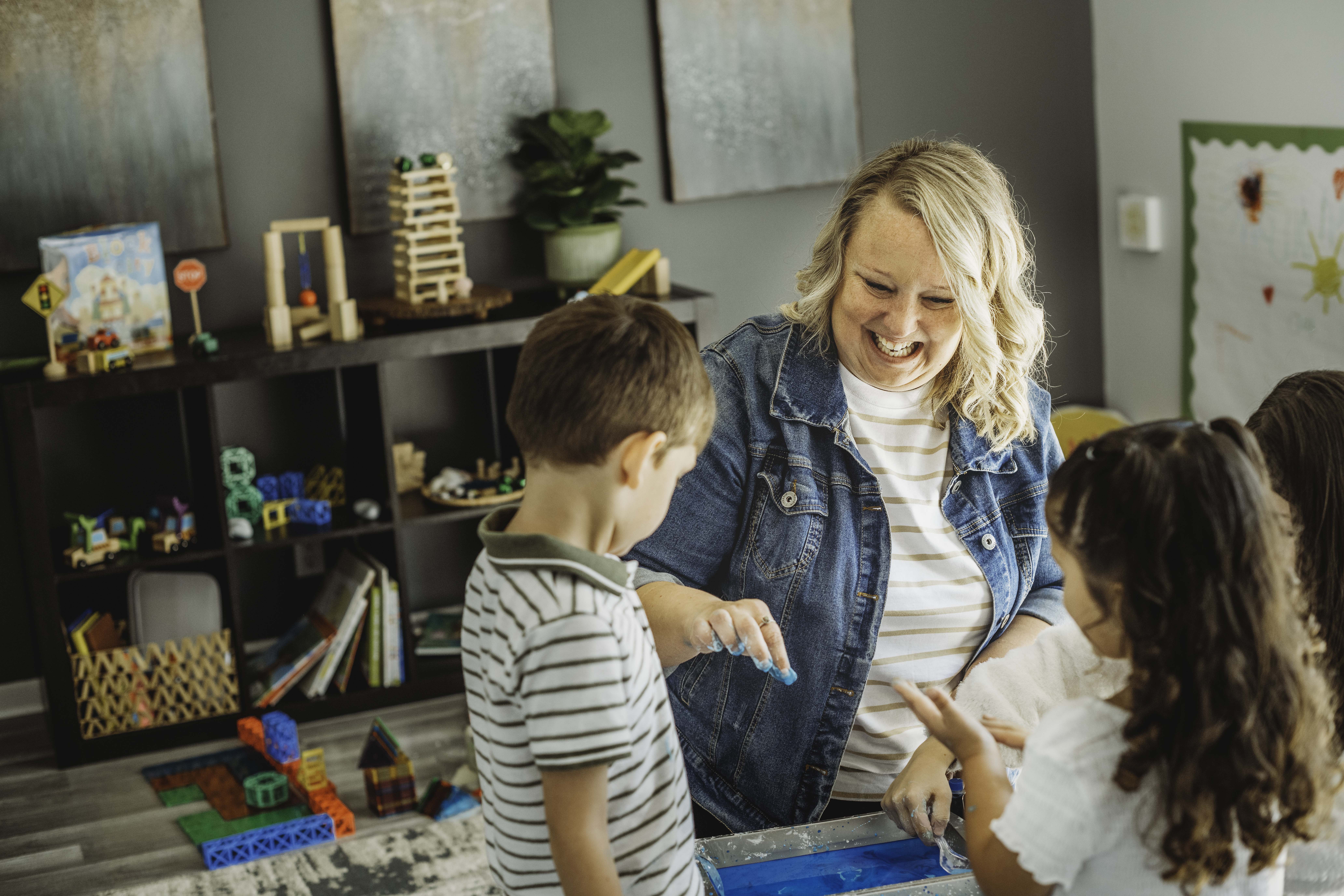 A school campus with buildings, open walkways, and greenery