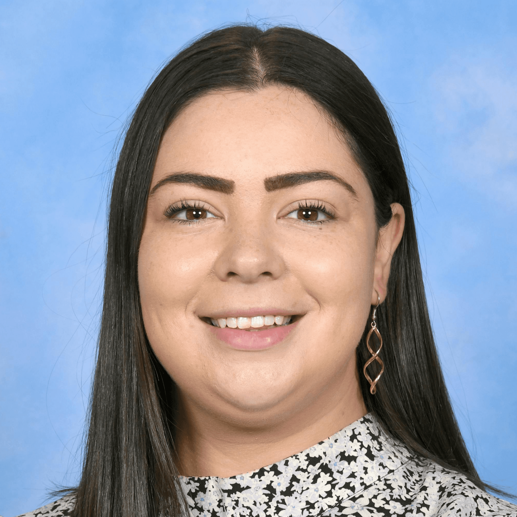 woman in white and blue checked dress shirt