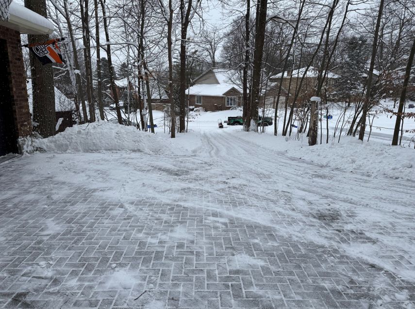 red and black ride on toy car on snow covered ground