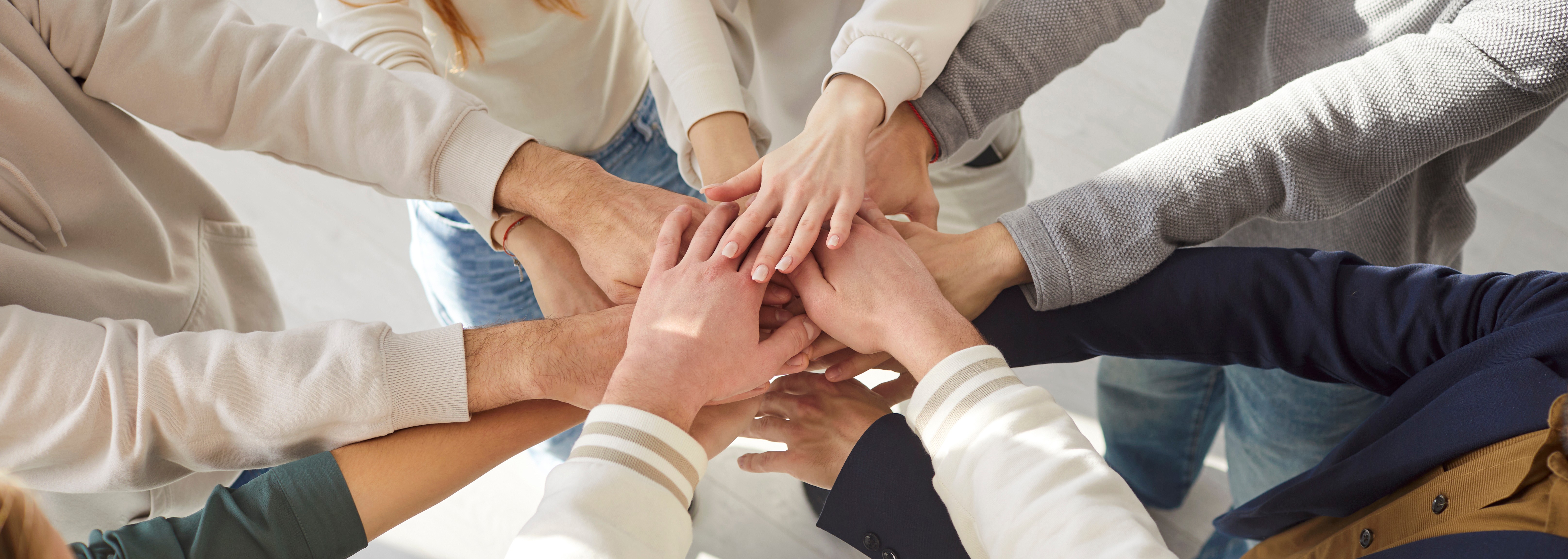 A team of pest controll experts carrying fog machine in an office