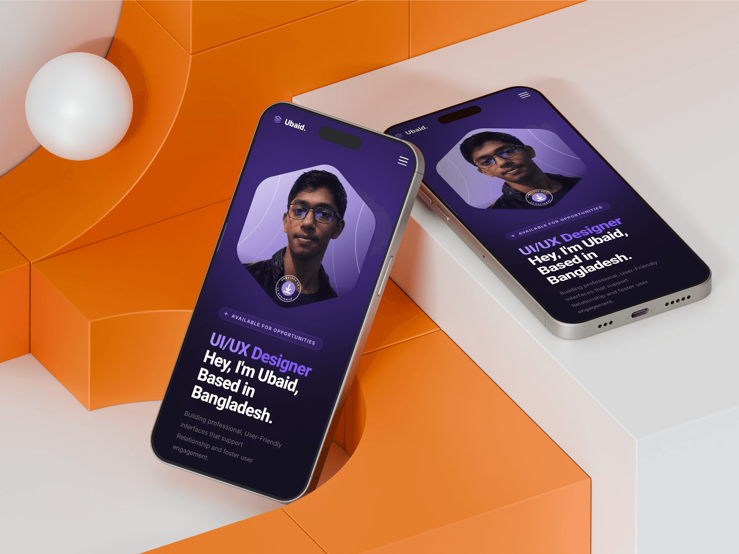 Dark website design mockup on a laptop, resting on an orange surface.