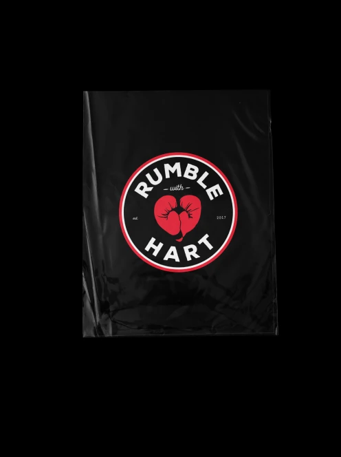 A close-up of a pink cocktail in a martini glass, set against a nighttime background with soft, blurred colors.