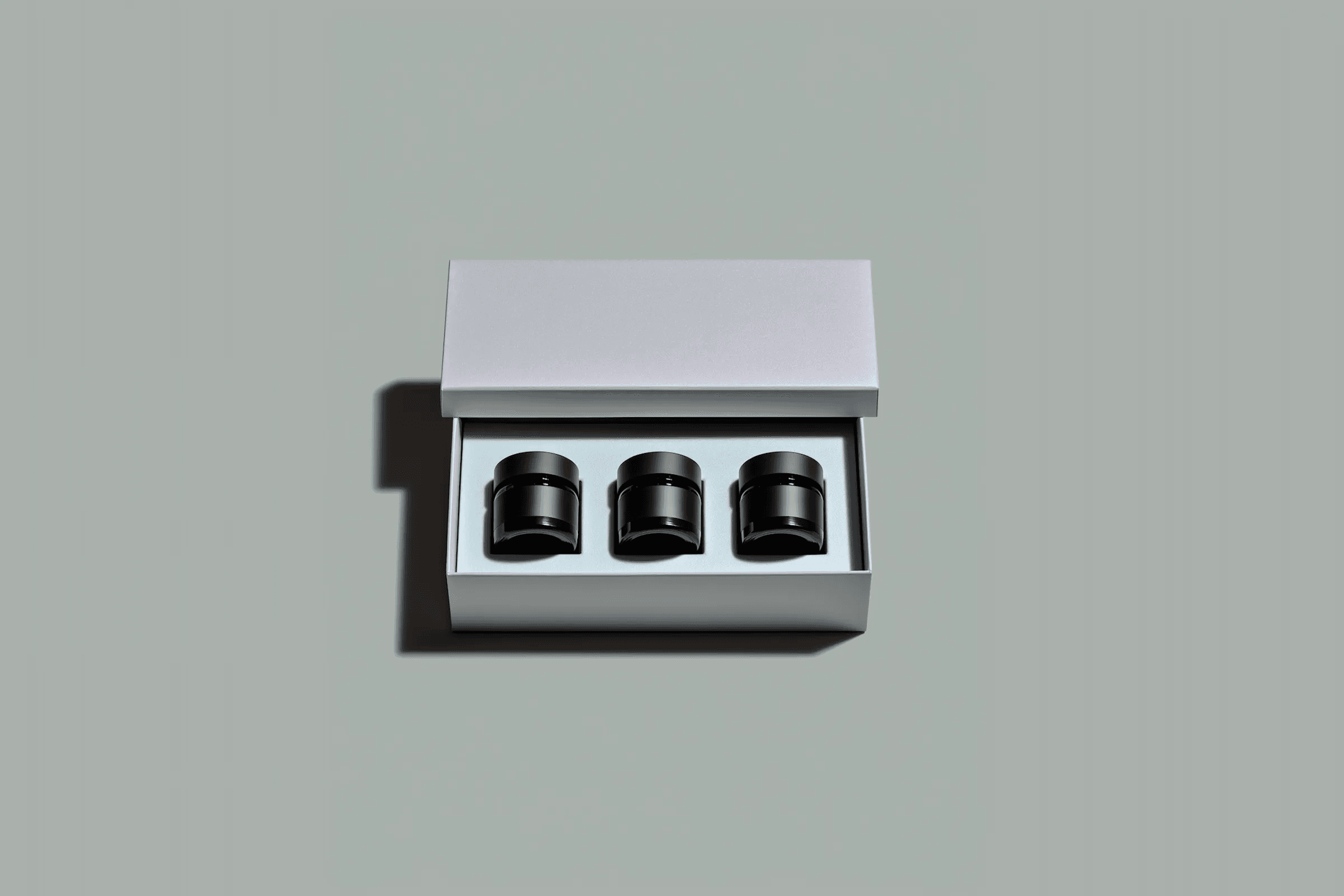 A set of three jars in a box