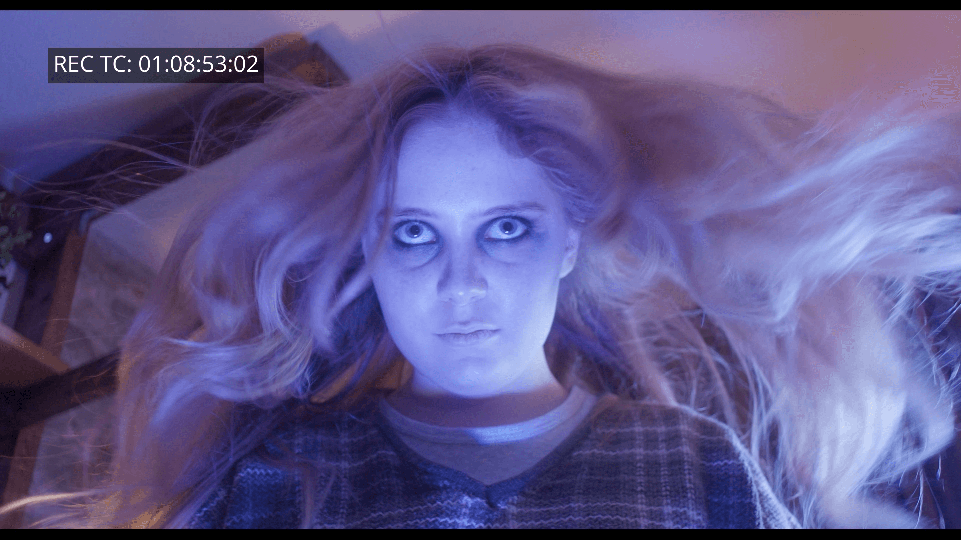 a woman holding an apple