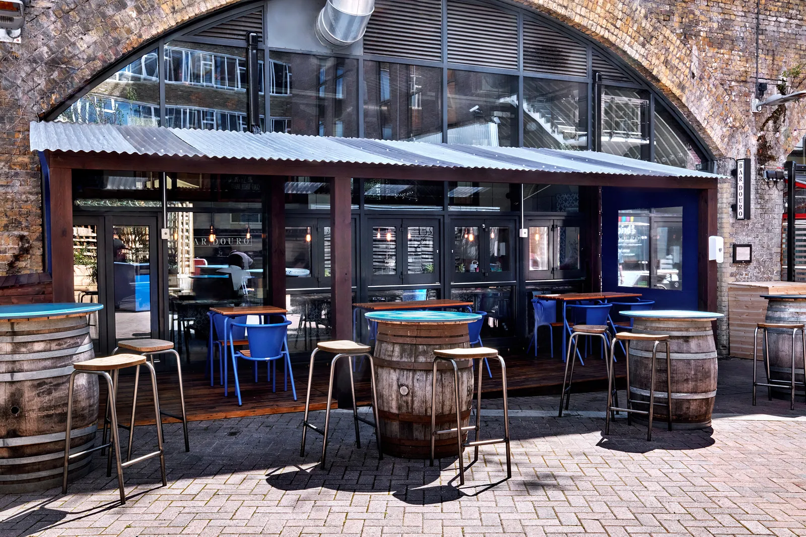utdoor seating at Bar Douro, a Portuguese restaurant near the Menier Chocolate Factory known for wine and small plates.