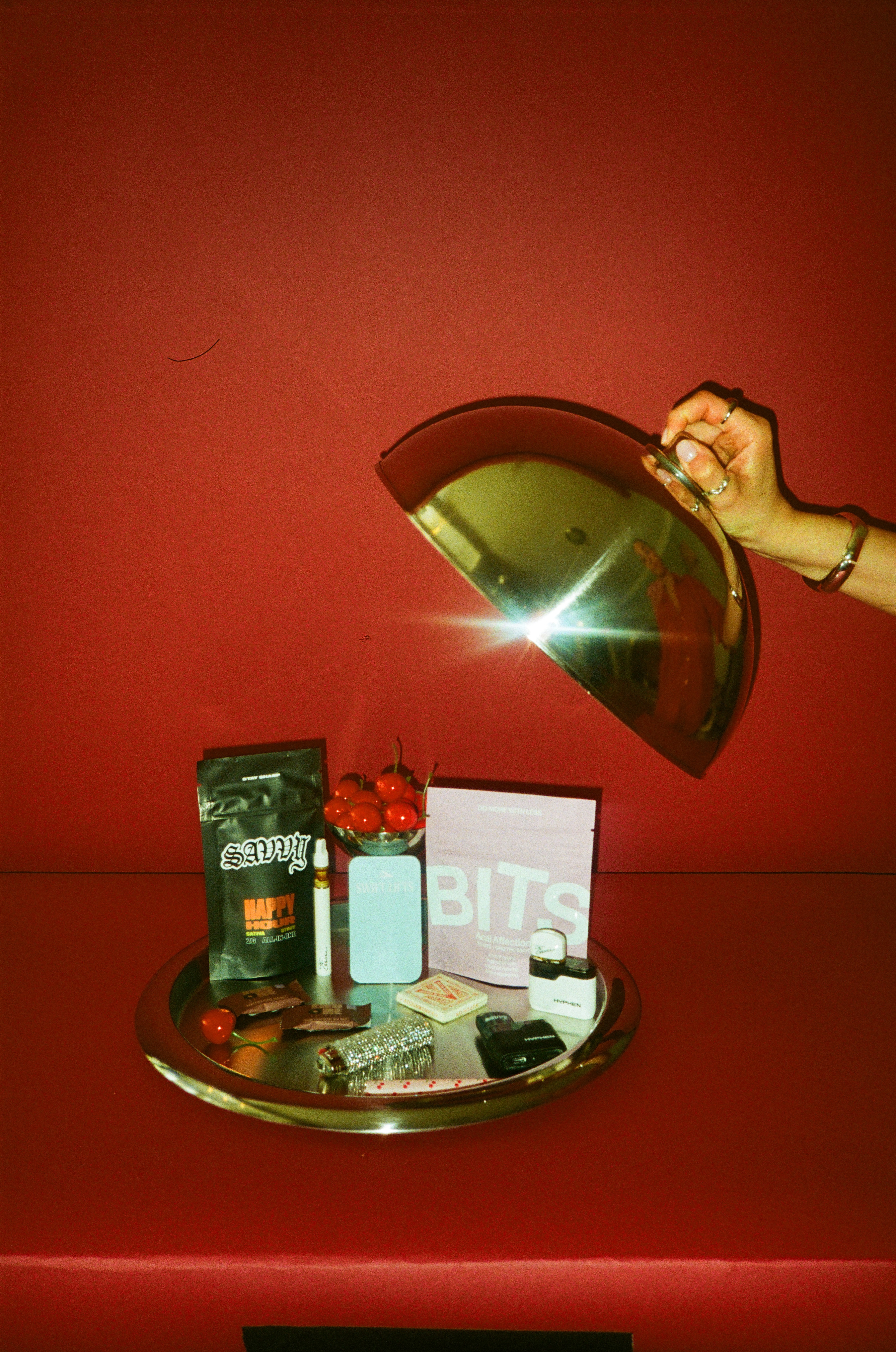 Woman with red hair covering mouth with hair