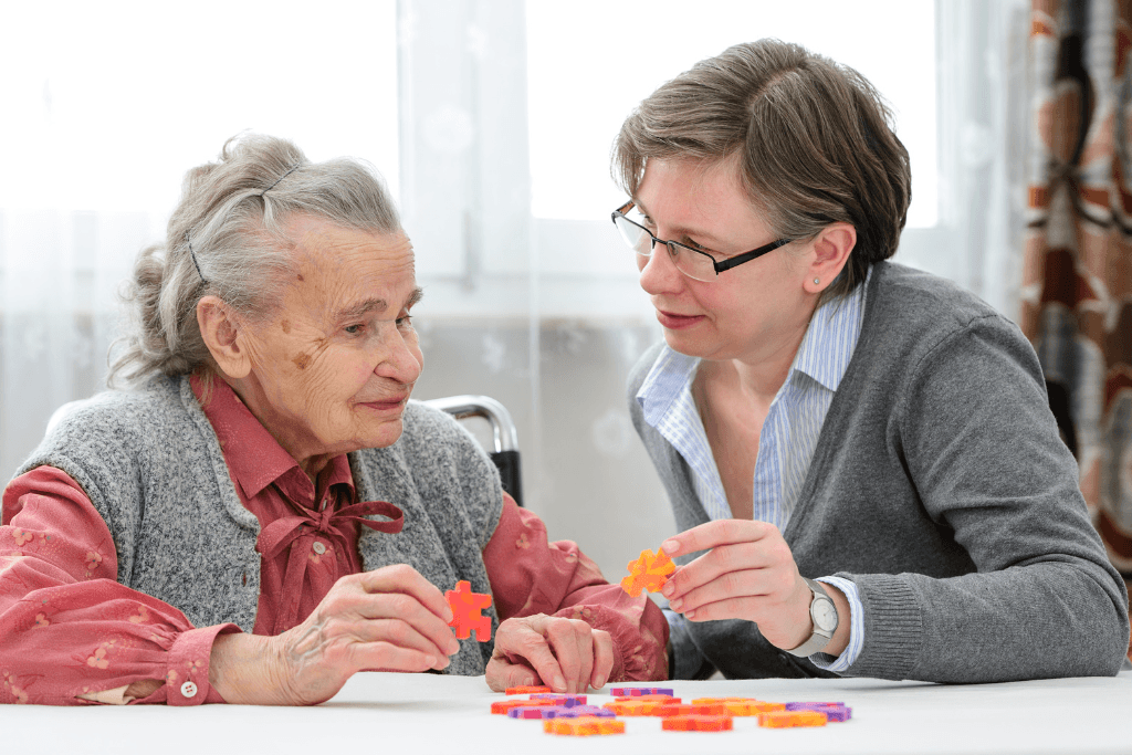 Senior woman with her elder care nurse