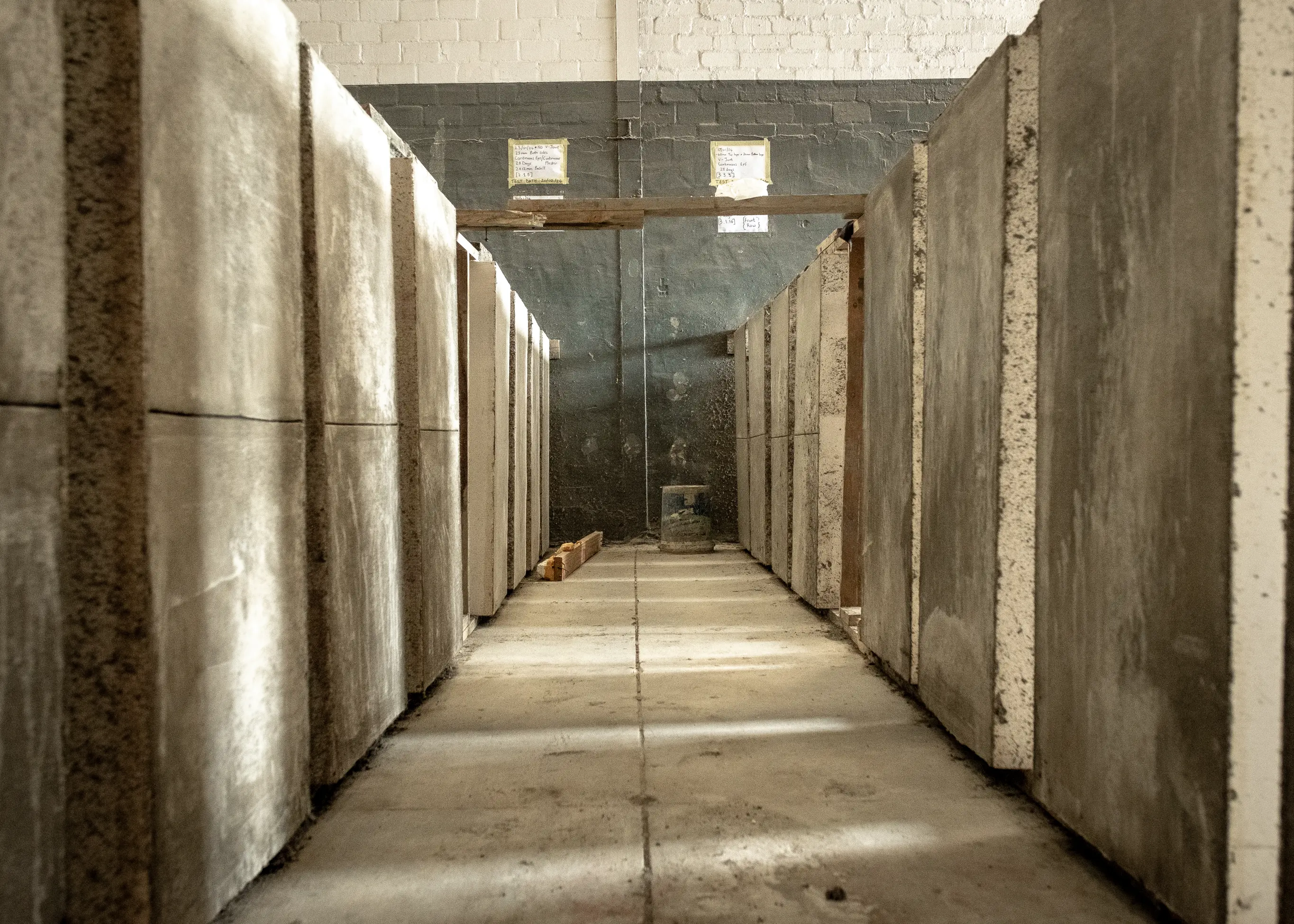 Orange roof with solar panels and overhead wires