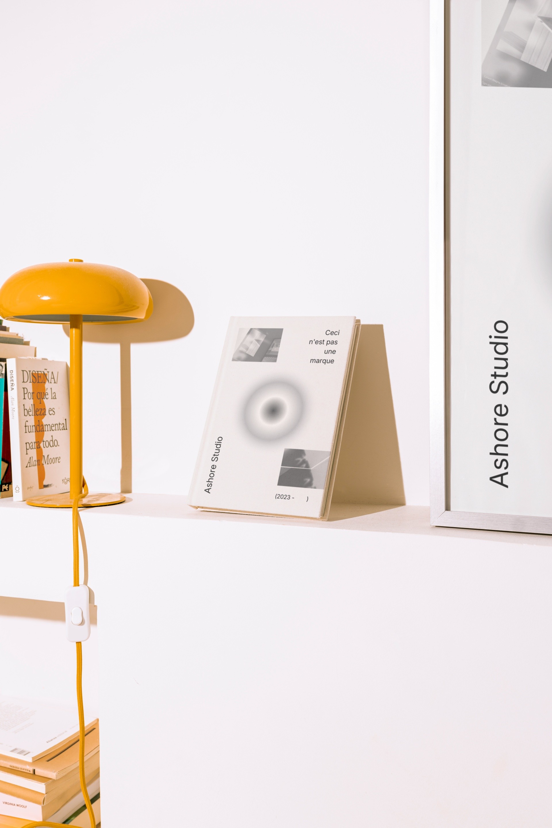 A man working on his computer in a dimly lit office space.