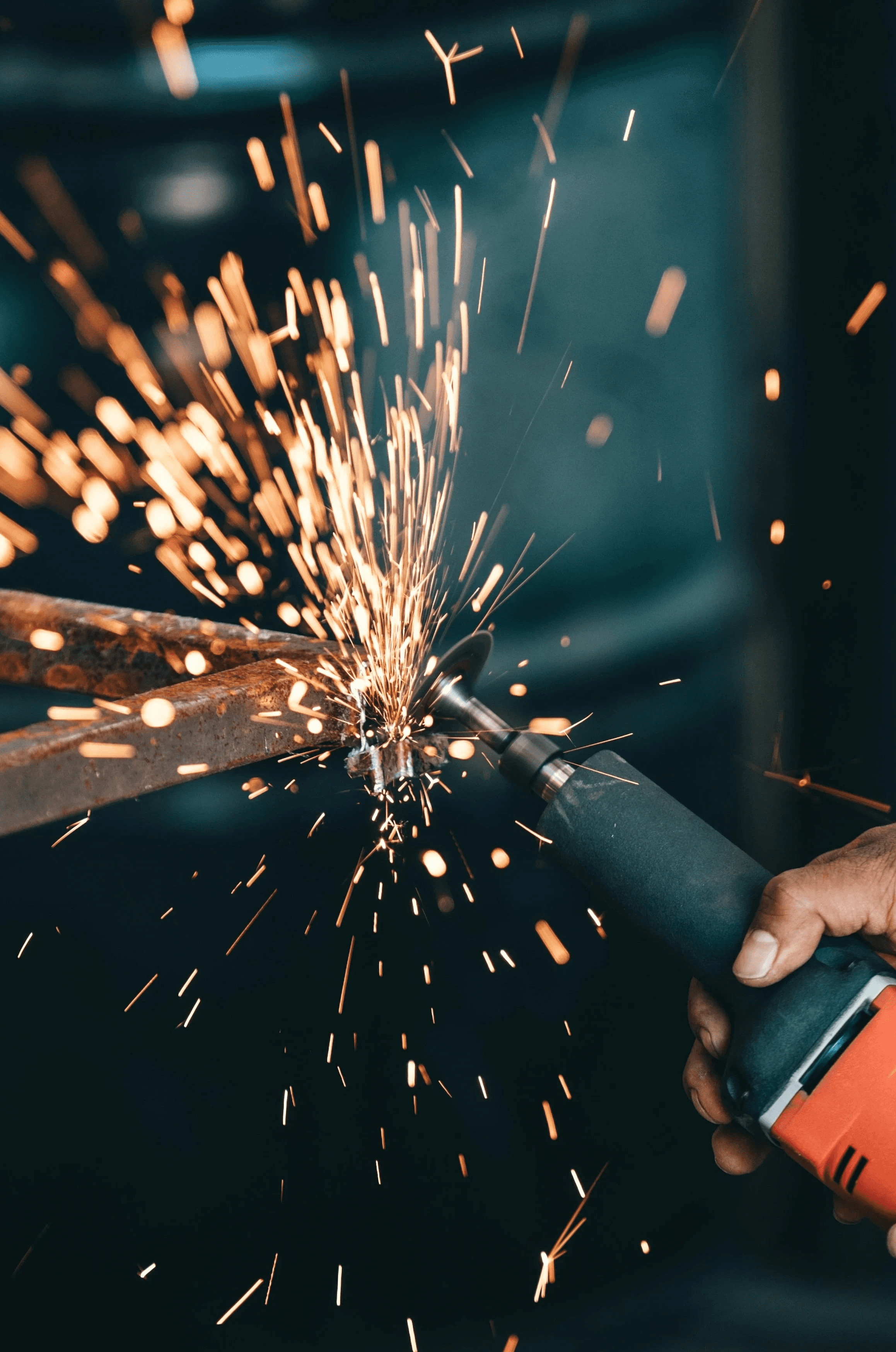 person using angle grinder