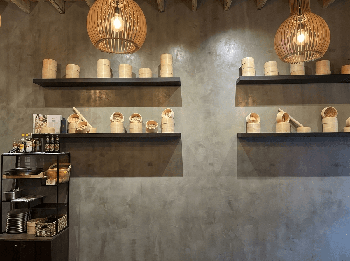 Interior of the KAI RAMEN counter with dark wood and warm lighting