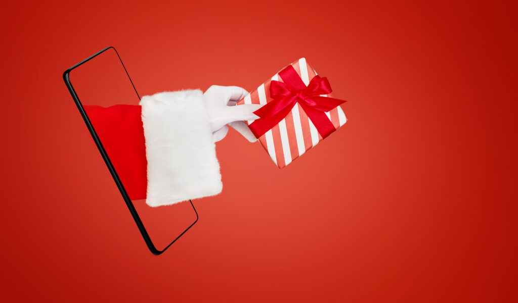 christmas santa claus hand holding or gives red gi 2025 12 07 18 27 55 utc 1