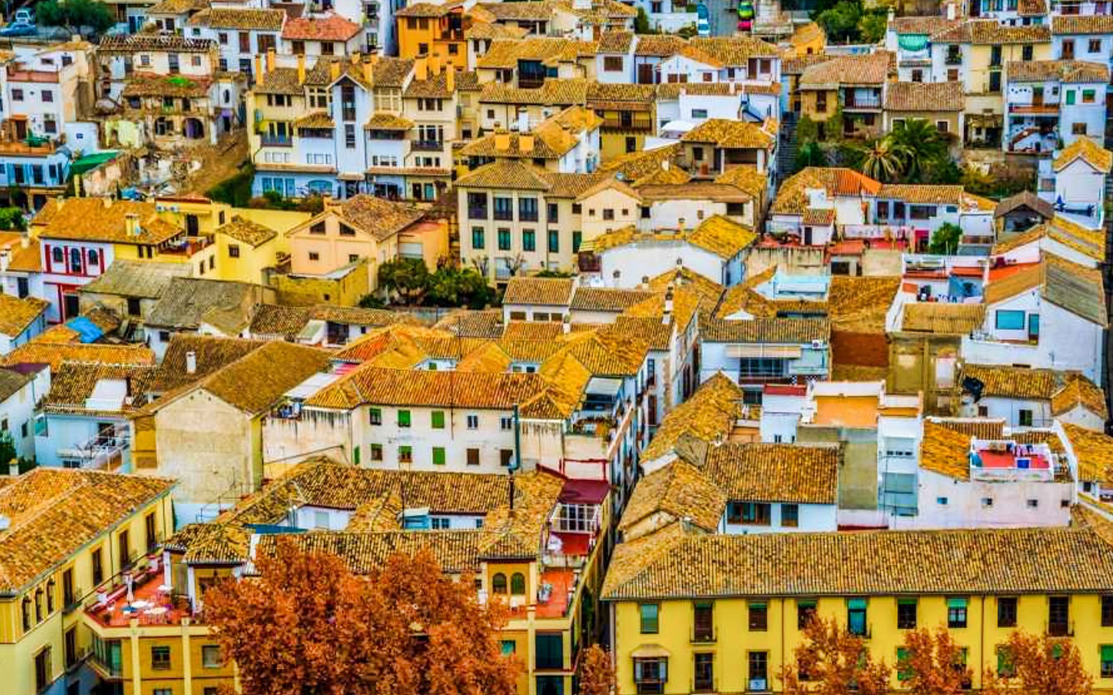 Aerial view of Albaicin's historic rooftops in Granada, Spain.