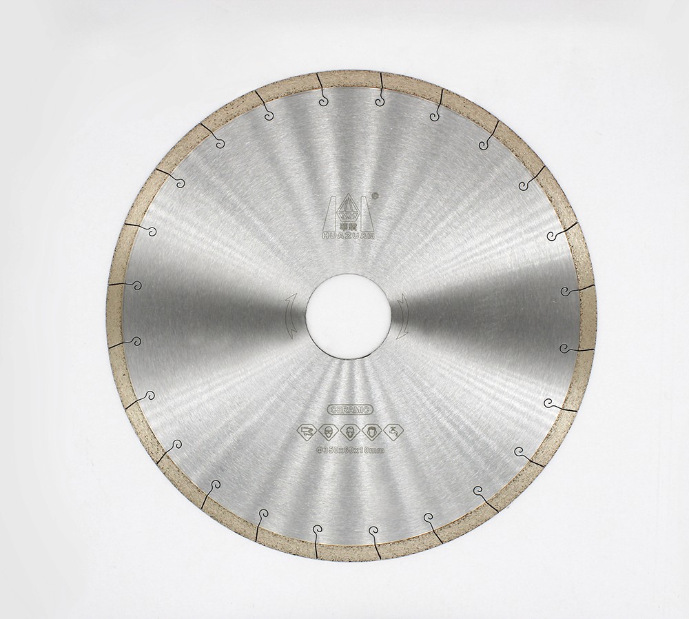 Full view of a sintered diamond saw blade for ceramic with a complete circular design and safety markings.