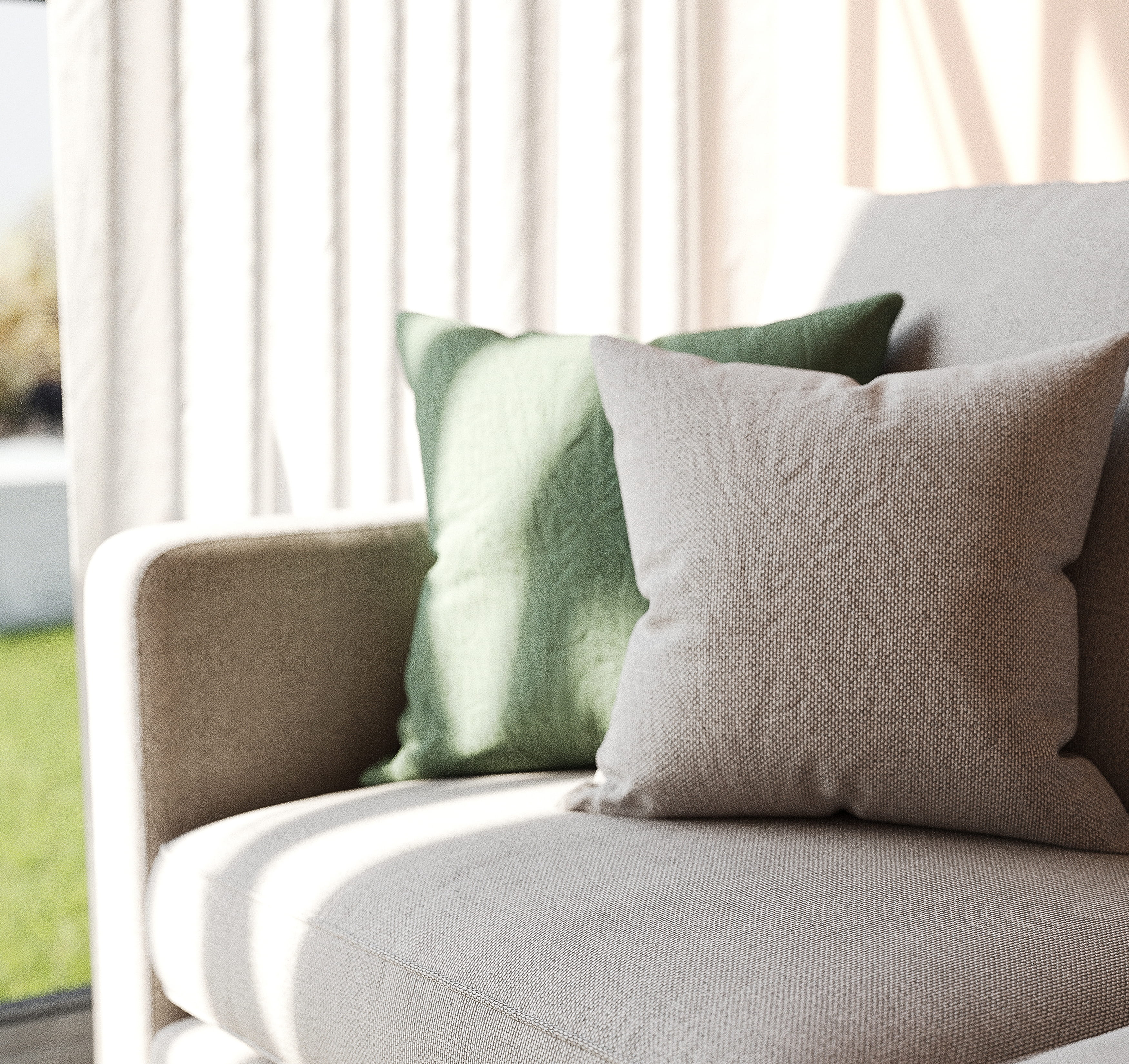 Sofa detail with soft upholstery and pillows in natural light