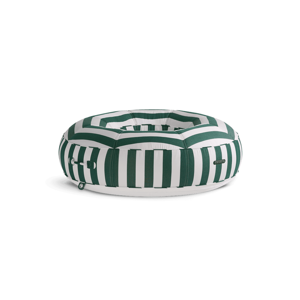 Ring-shaped luxury pool float in bold green-and-white stripe canvas with quilted panels and white base
