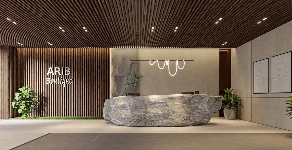 In a sleek kitchen at Arib Boutique, a lobby, highlighting the modern apartment's stylish interior.