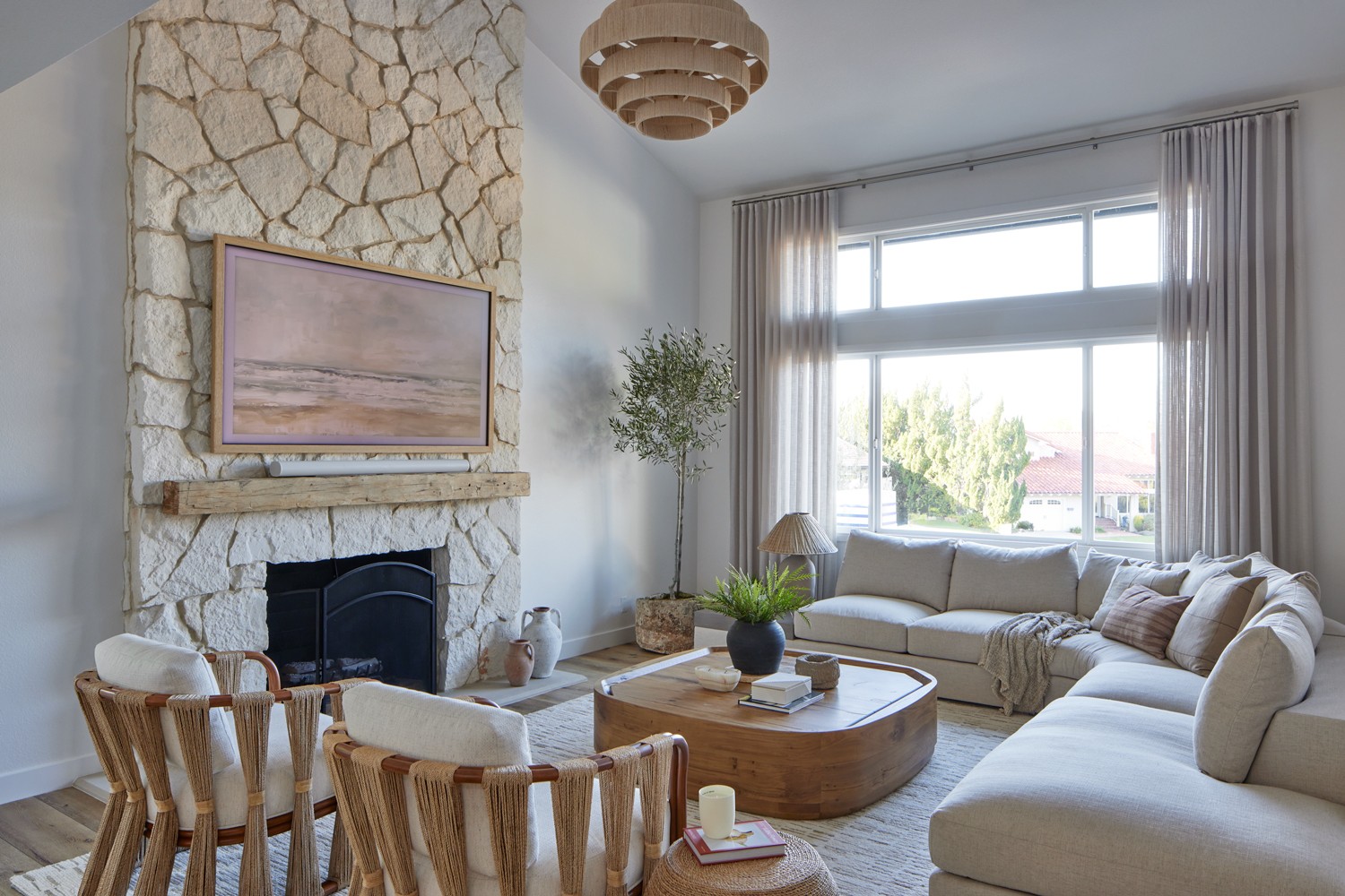 A Modern and inviting contemporary living room design featuring warm earth tones and natural textures