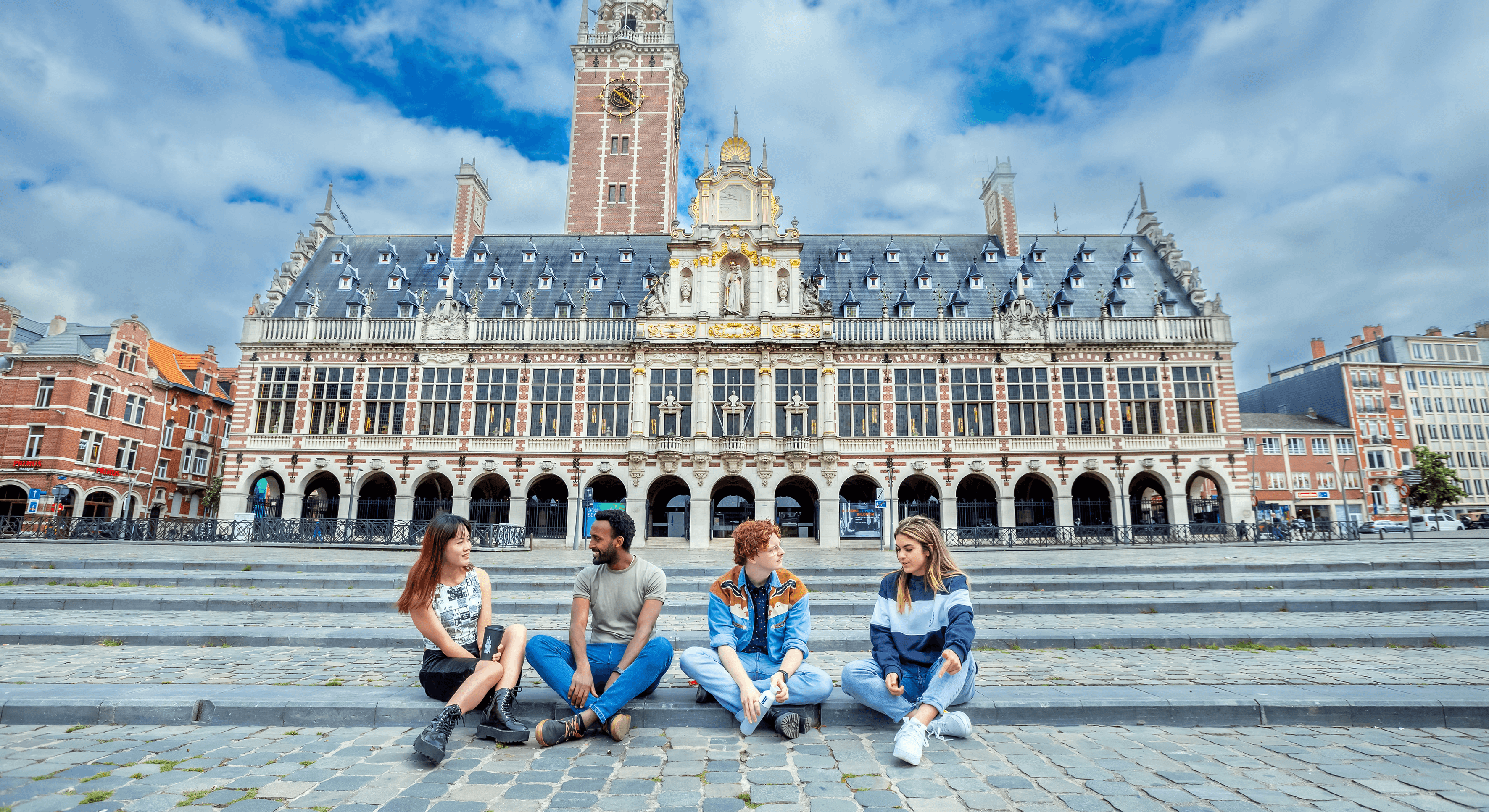 Three children jumping in burlap sacks during a race.