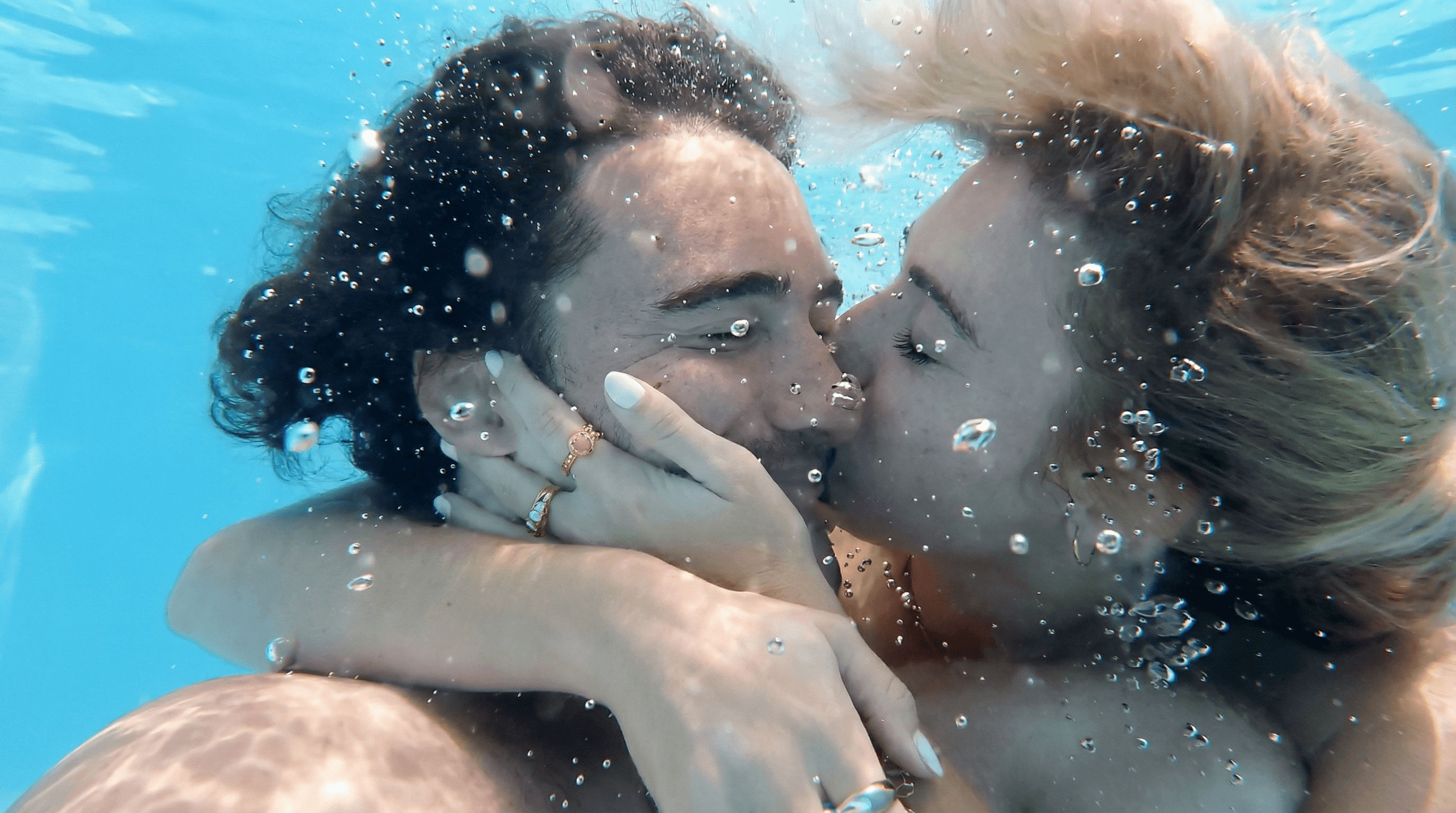 Streetside billboard with flyposters of the Batch.Works brand and illustrations