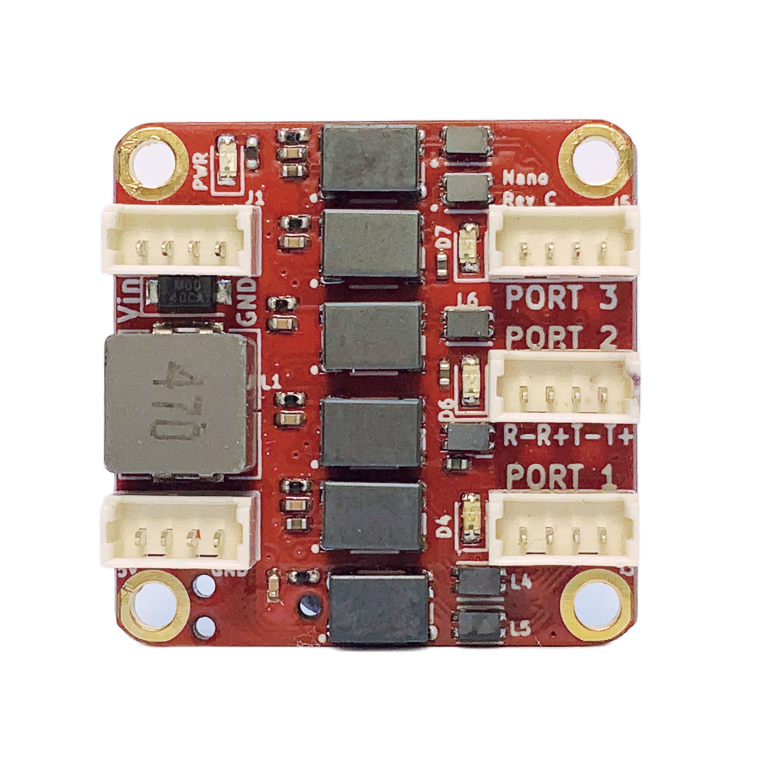 Top view of SwitchBlox Nano Rev C, a coin-sized three-port Ethernet switch with Picoblade connectors