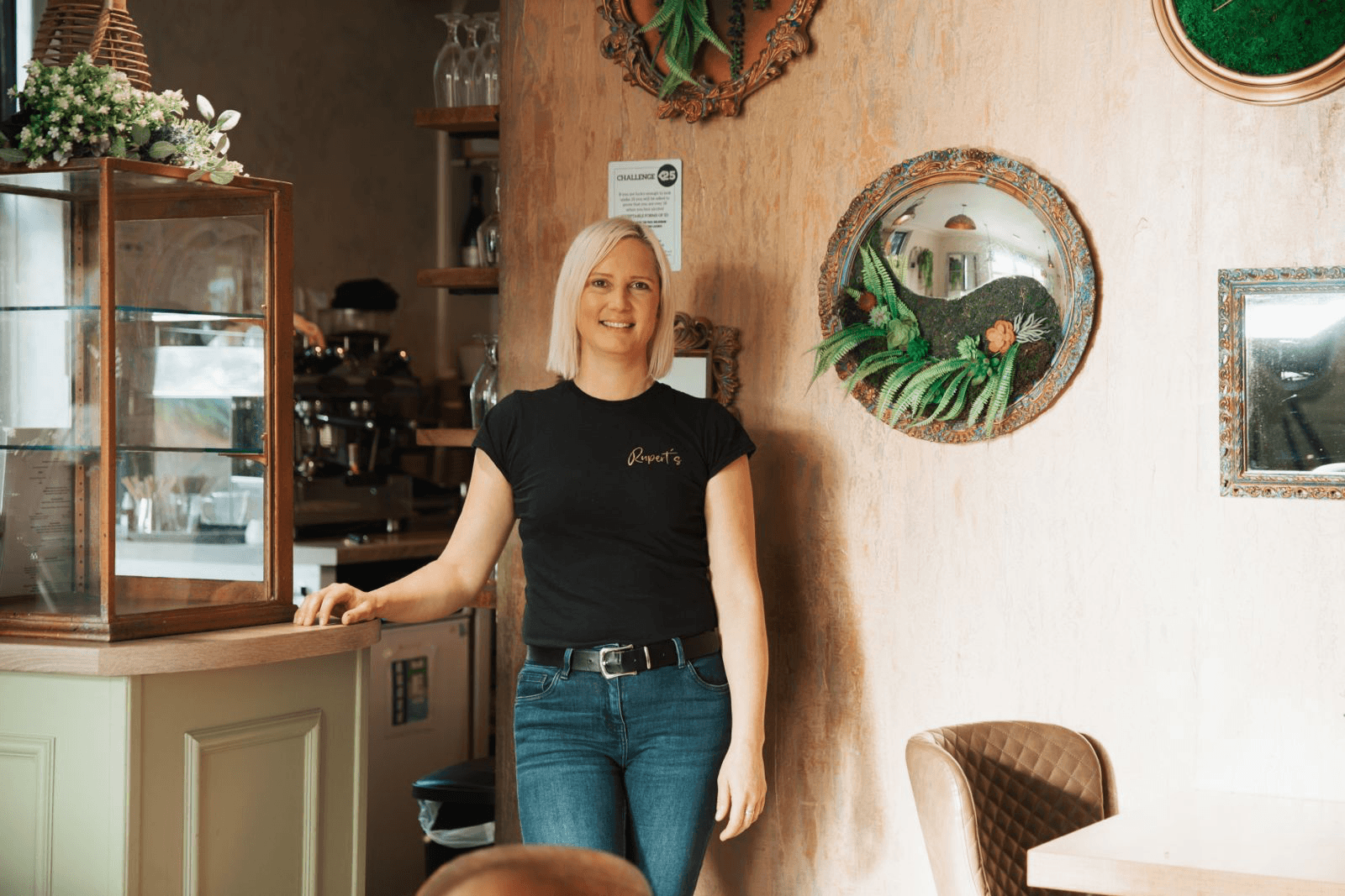 a dimly lit room with a large window