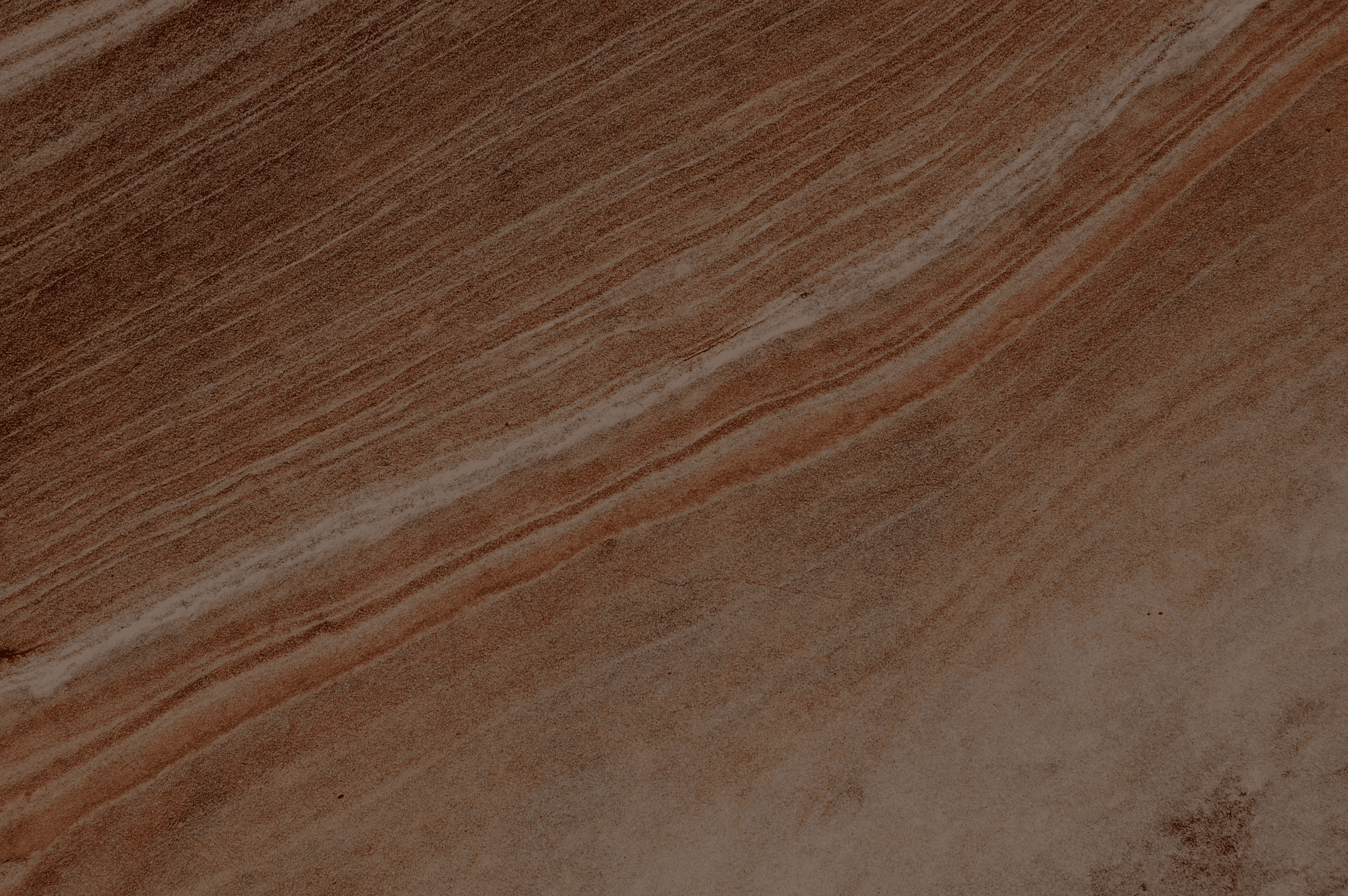 a piece of wood that is brown and red
